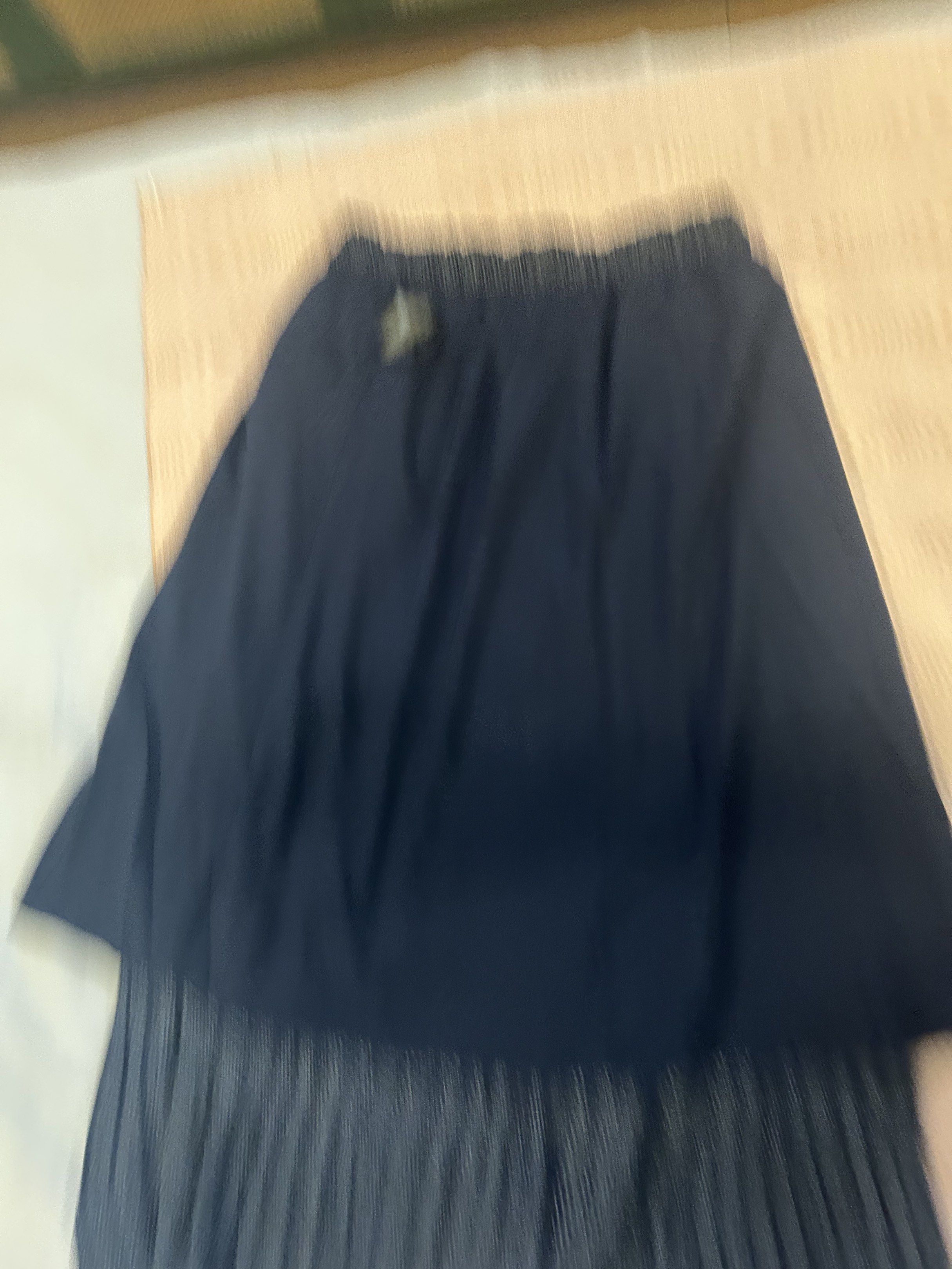 Uniqlo Pleated Skirt (Category: Skirts) located in Las Pinas. Submitted by tinamontec00246 (Listing ID 1419049641, Image 2). Description: - Uniqlo navy blue pleated skirt - bought in Tokyo - Polka dot pattern - Elastic waistband - Made in China - Waist: 40-66cm - Hips: 78-91cm - length 42” .