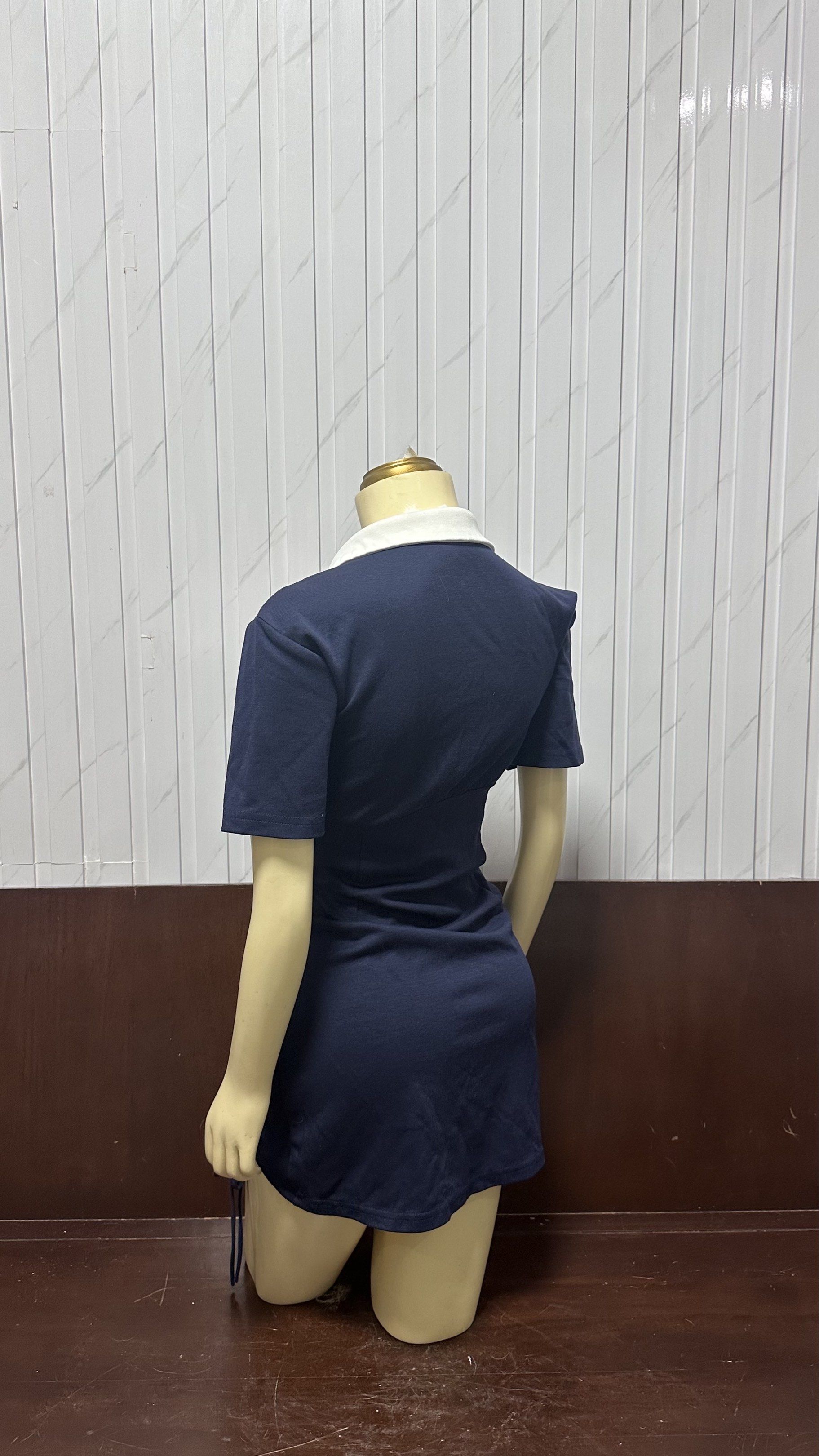 University Style Ruched Dress (Category: Dresses) located in Taguig. Submitted by ylluhhhh (Listing ID 1419191877, Image 2). Description: - Navy mini dress - White collared neckline - Short sleeves - Ruched design with adjustable drawstrings - University-style print on the front - Ideal for casual wear.