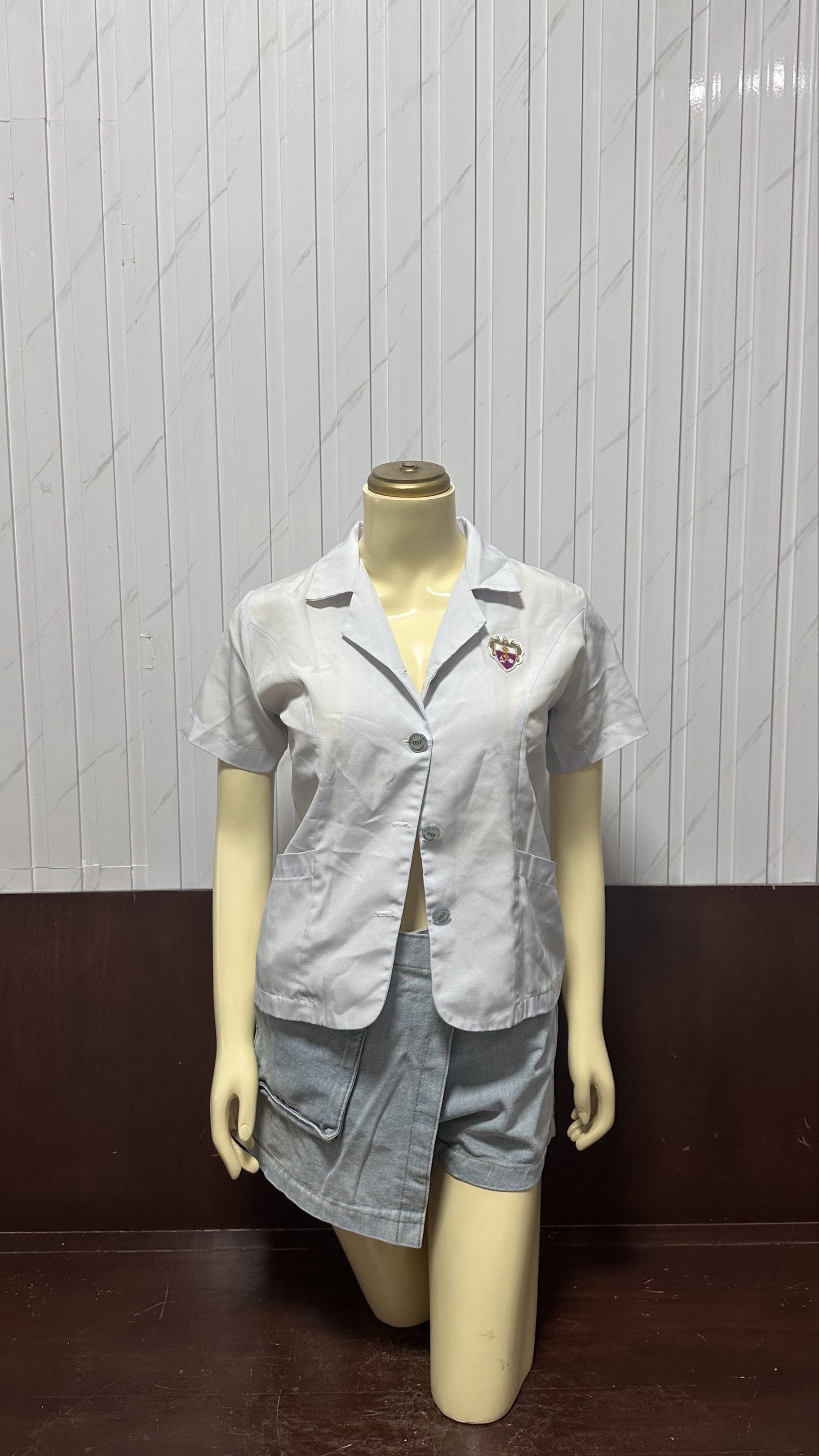 UST Faculty of Pharmacy (top only) (Category: Sets or Coordinates) located in Taguig. Submitted by ylluhhhh (Listing ID 1419192129, Image 1). Description: - School uniform set - Includes: light gray blazer and denim-like wrap skirt - Blazer features: short sleeves, buttons, and emblem - Suitable for: school, themed events.