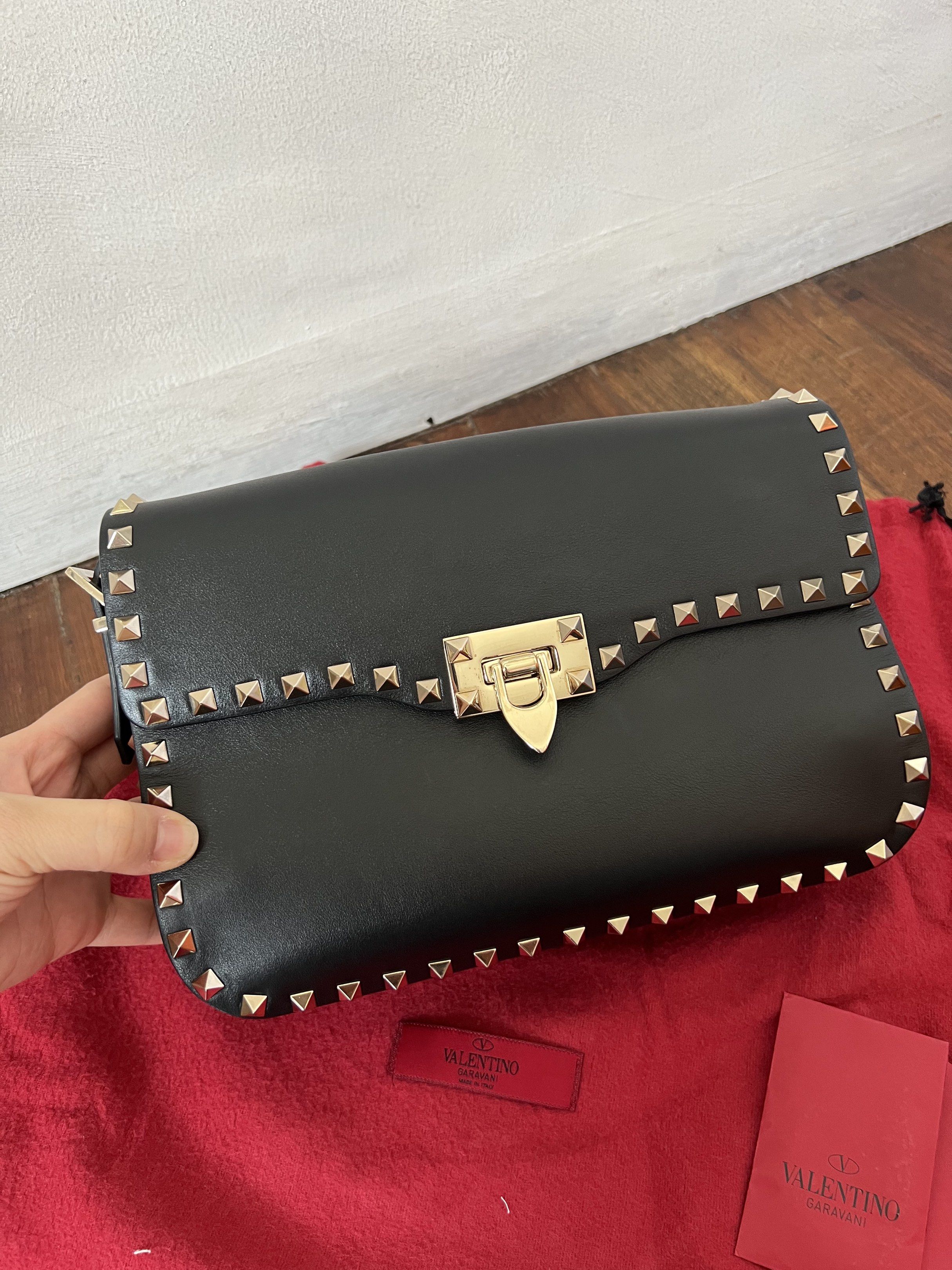 Valentino Flip Lock Flap Bag (Category: Cross-body Bags) located in Quezon City. Submitted by kdiv_ (Listing ID 1419033453, Image 2). Description: Personal preloved |Guaranteed Authentic Bought in Saks Fifth NYC Medium in Black Inclusions: Strap, Replacement Studs, Cards and Dust Bag RFS: Decluttering, no longer being used MOP: BDO/GCash Shipping fee to be shouldered by the buyer.