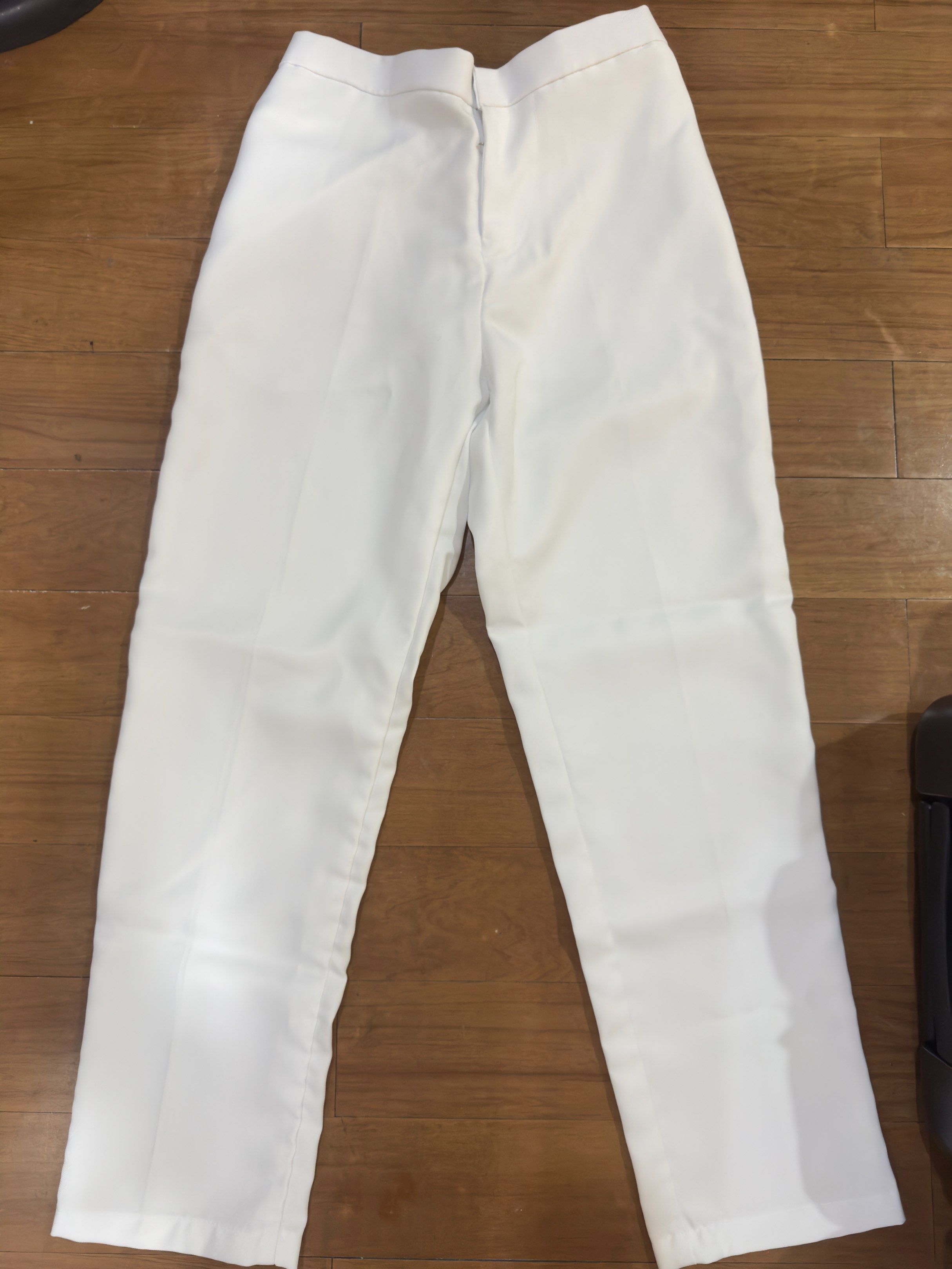 White Pants (in peach twill) M-L frame (Category: Other Bottoms) located in Manila. Submitted by bheyzee (Listing ID 1419131373, Image 1). Description: - Last worn during internship - Waist: 28-30 inches (GARTERIZED) - Hips: 35 inches - Length: 38.5 inches (good for 5’5) - No stains, no inner lining (best used with nude seamless underwear during duty).