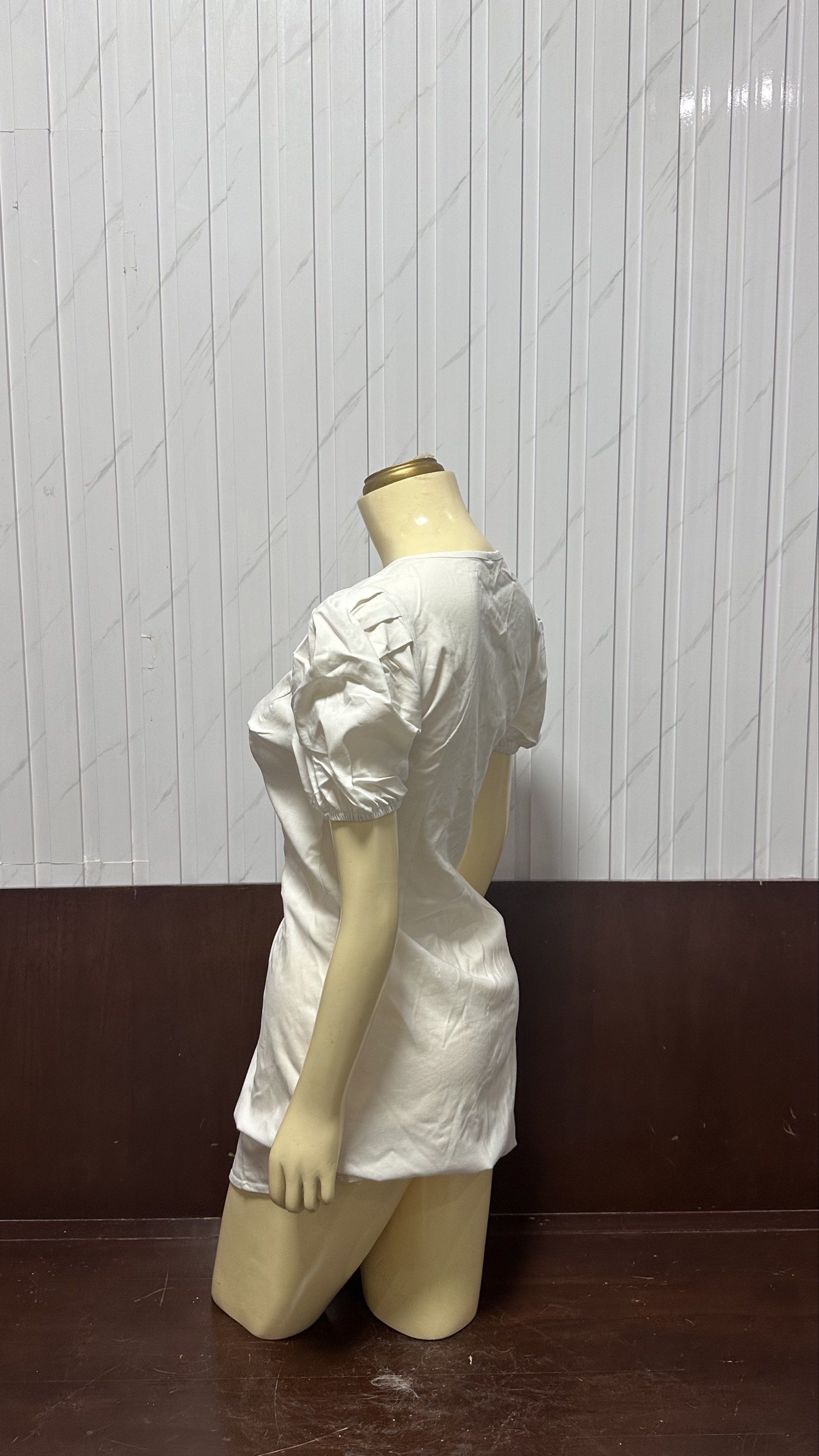 White Zippered Dress (Category: Dresses) located in Taguig. Submitted by ylluhhhh (Listing ID 1419191911, Image 2). Description: - White V-neck dress - Short, puffed sleeves - Zippered front - Fitted silhouette - Knee-length - Smooth fabric.