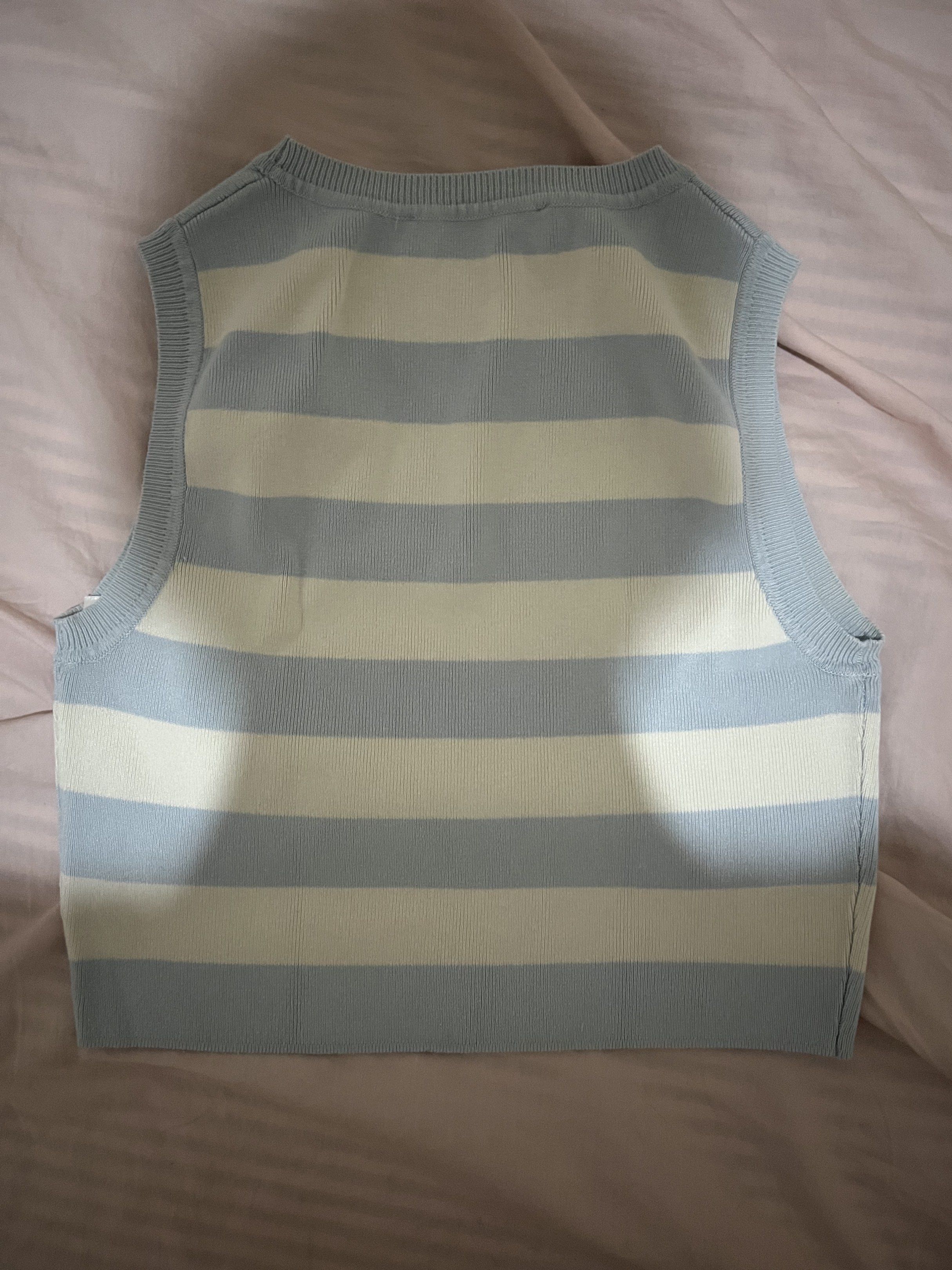 Zara Striped Knit Top - Size L (Category: Blouses) located in Quezon City. Submitted by barthesbie (Listing ID 1419072451, Image 3). Description: - Zara knit top - Blue and white stripes - baby blue ; light blue - Sleeveless - Round neck - Size L - Ribbed texture - Made in Bangladesh - best fits medium - great for clean girl :).
