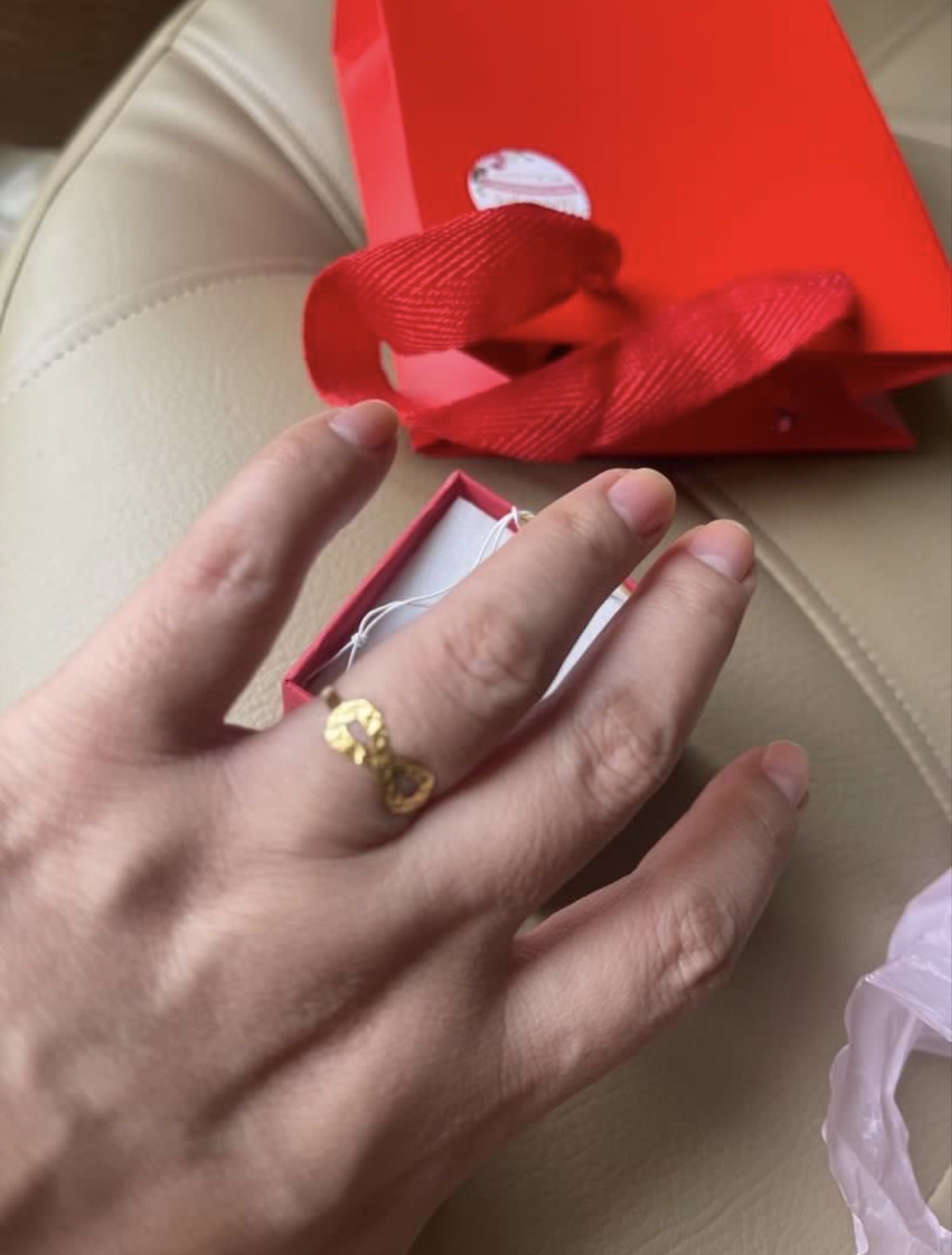18K Gold Infinity Ring (Category: Rings) located in Bulacan. Submitted by grazcloset (Listing ID 1420756782, Image 2). Description: - Gold infinity ring - Delicate design - Suitable for everyday wear or special occasions - Presented in a pink gift box.