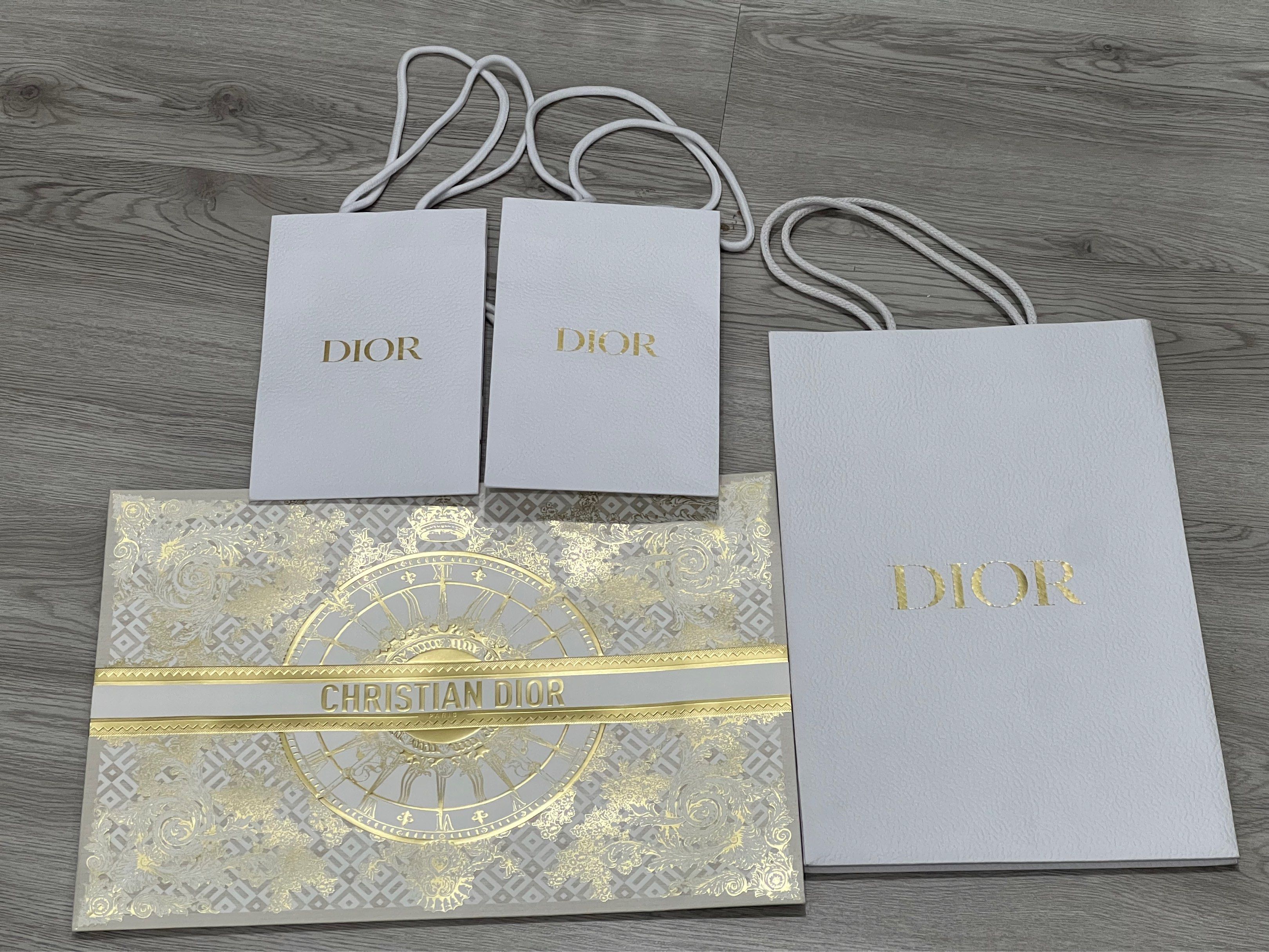 500 each! Dior Gift Set with Paper Bags (Category: Luxury Bags & Wallets) located in Mandaluyong City. Submitted by mygoodfindsph (Listing ID 1402292788, Image 1). Description: 500 per bag - Authentic Dior paper bags in various sizes - Features the iconic Dior logo in gold - Includes a decorative Christian Dior box .