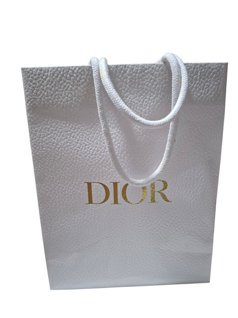 AUTHENTIC DIOR TEXTURED SHOPPER BAG (Category: Luxury Bags & Wallets) located in Las Pinas. Submitted by annachiaonair2037 (Listing ID 1420875108, Image 2). Description: no issue H 10" L 7.5".
