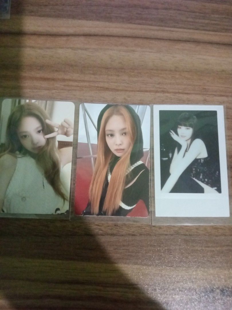Blackpink Jennie Photocard set (Category: K-Wave Merchandise) located in San Pedro. Submitted by eye_spy (Listing ID 1420753358, Image 2). Description: Set of Blackpink photocards featuring Jennie . Includes two Jennie photocards and one Jennie Born pink Polaroid-style card. The Jennie cards show her with long hair and in a white top and a black hoodie. All cards are in protective sleeves..