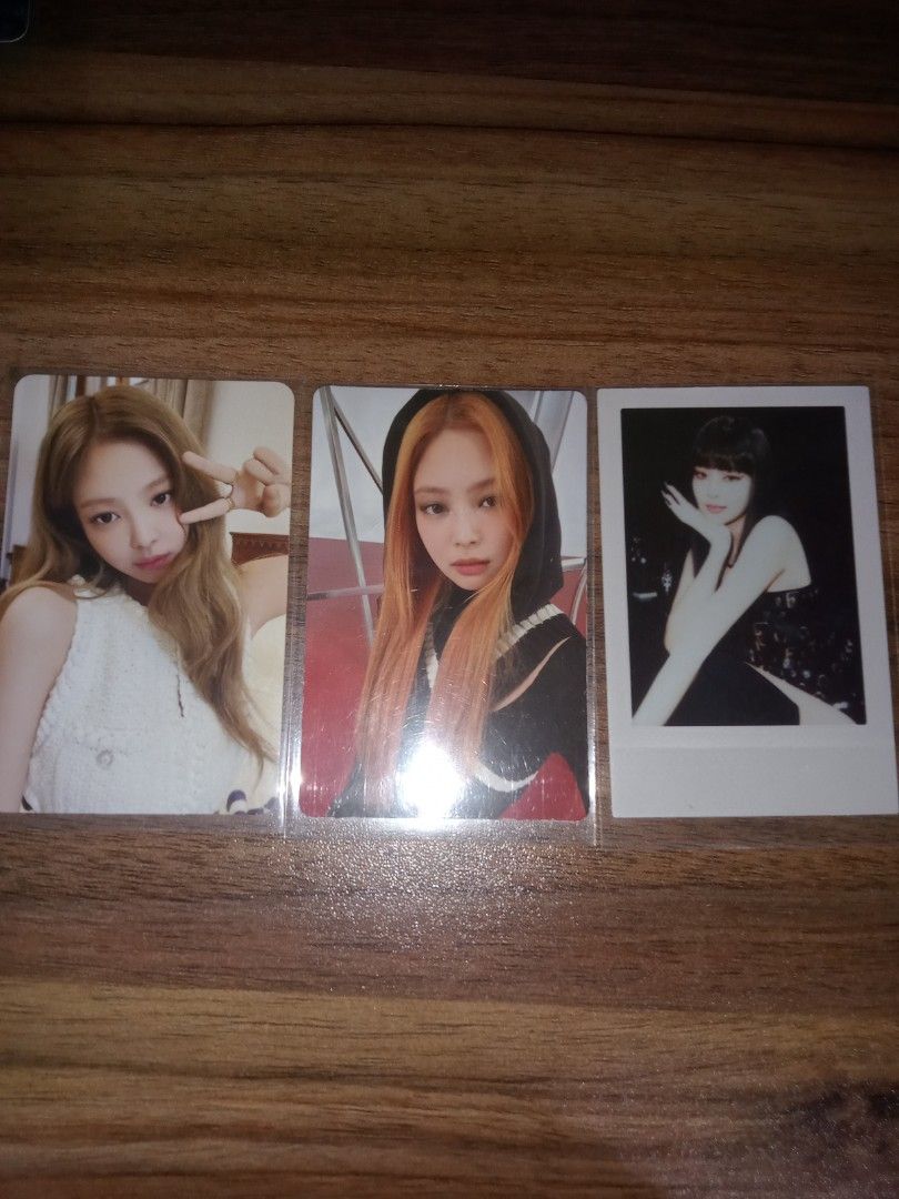 Blackpink Jennie Photocard set (Category: K-Wave Merchandise) located in San Pedro. Submitted by eye_spy (Listing ID 1420753358, Image 1). Description: Set of Blackpink photocards featuring Jennie . Includes two Jennie photocards and one Jennie Born pink Polaroid-style card. The Jennie cards show her with long hair and in a white top and a black hoodie. All cards are in protective sleeves..