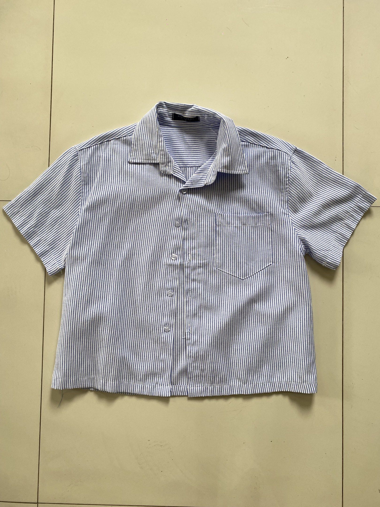 Blue Striped Short Sleeve Shirt (Category: Shirts) located in Valenzuela. Submitted by mikaaaami (Listing ID 1420796433, Image 1). Description: ☆ Very cute trendy striped top! ☆ Used only once ☆ Will keep if no one buys for 2 days hehe ☆ Fits XS-M.