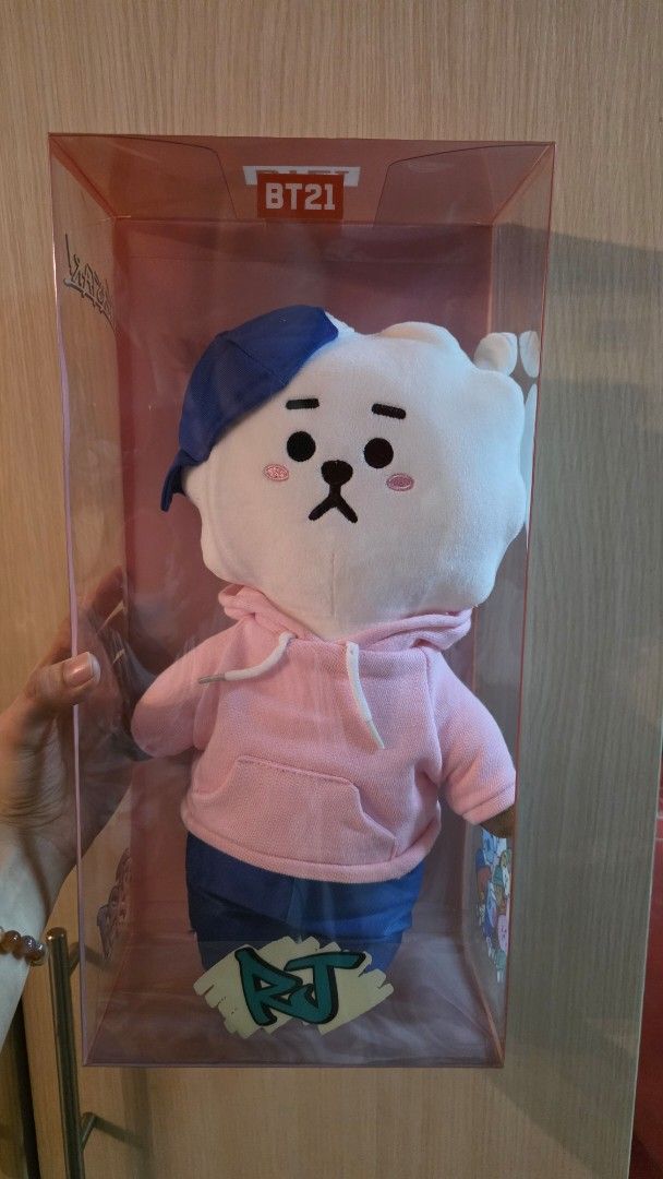 BT21 RJ Plush Toy (Category: Plushies & Soft Toys) located in Caloocan City. Submitted by isabuysph (Listing ID 1420858561, Image 1). Description: - BT21 Brand New RJ plush toy - Comes in a clear box - Approximate dimensions are 190 x 140 x 345mm - Sale item ✨️ selling for php 1,200 .