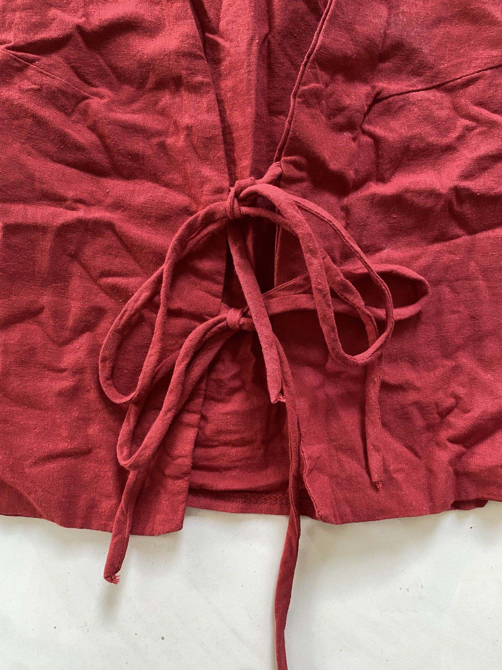 Calista Apparel Red Front-Tie Top (Category: Sleeveless) located in Valenzuela. Submitted by mikaaaami (Listing ID 1420794920, Image 2). Description: ☆ Solid red color ☆ Fits XS-S ☆ Has a very small stain at the back but washable.