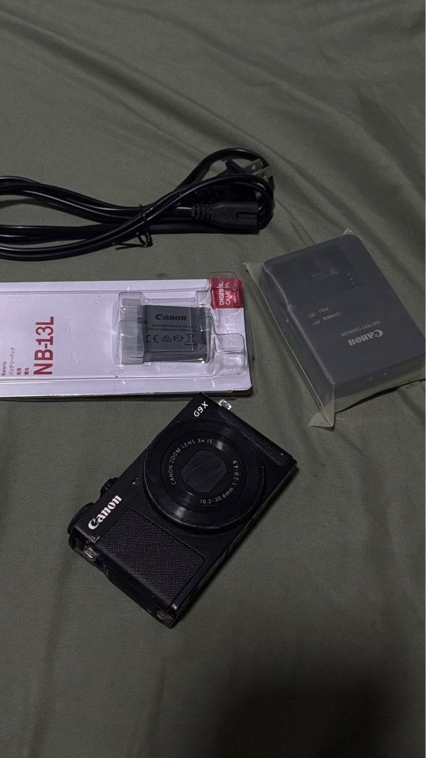 Canon G9x (Category: Cameras) located in Cebu City. Submitted by gilejehhk (Listing ID 1420798319, Image 1). Description: Compact and powerful camera — perfect for travel or everyday photography! ✅ Everything works perfectly: • Pop-out flash 💡 • Touchscreen 📱 • Control ring 🔘 • All buttons responsive 🎛️ • Output 100% okay (photo and video quality excellent!) ⚠️ Minor issue: LCD has visible lines, but still functions. Comes as-is. Great deal f