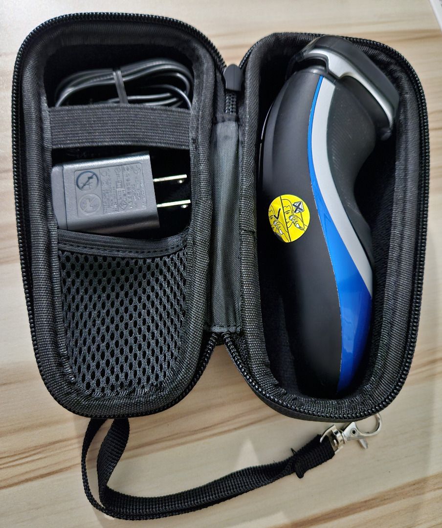 Carrying Case for Electric Shaver (Category: Men's Grooming) located in Makati City. Submitted by KuWeLaDevil01 (Listing ID 1420860854, Image 2). Description: NOTE: Shaver & Charger are not included (It's not hygienic to buy these 2nd-hand.) Used twice only for a total of eight (8) local travel days. Exterior is made of premium hard EVA material while the interior is soft, giving full protection for the shaver. There is an extra mesh pocket for s