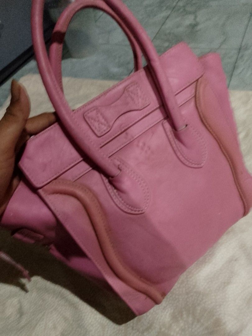 Celine Pink Leather Handbag (Category: Luxury Bags & Wallets) located in Manila. Submitted by angelofetr74296 (Listing ID 1420892020, Image 2). Description: - Celine pink leather handbag - Top handle design - Front zipper pocket - Interior zipper pocket - Silver-tone zipper and hardware - Brand tag and serial number inside.