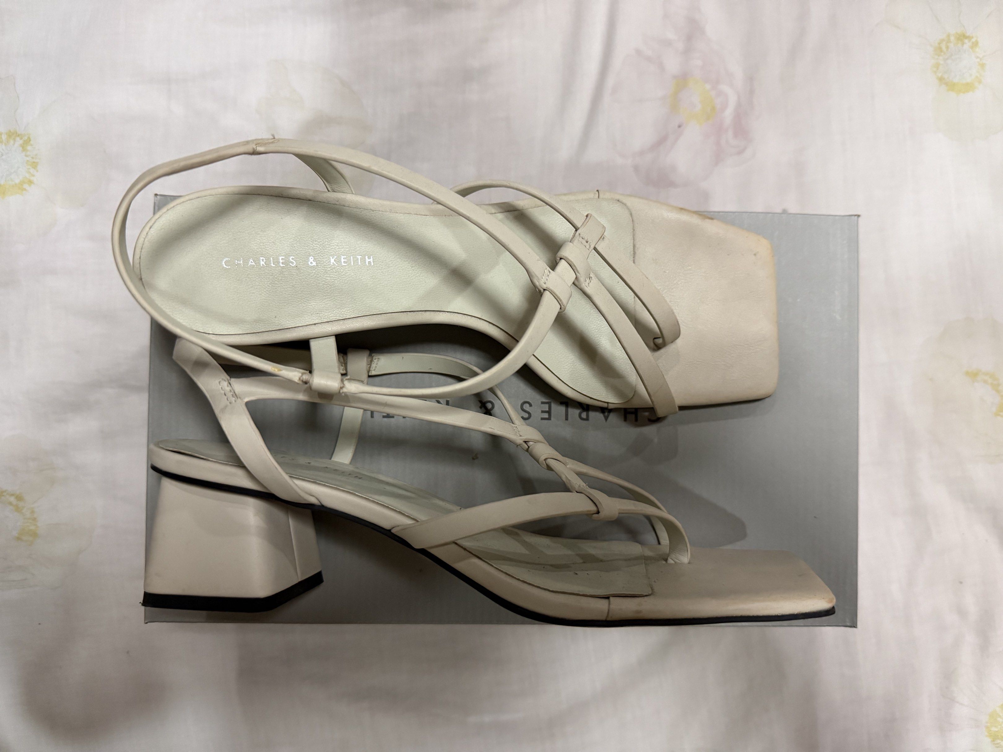 Charles & Keith Chalk Thong Sandals Size 38 (Category: Flats & Sandals) located in Quezon City. Submitted by chasy9 (Listing ID 1420871999, Image 2). Description: - Charles & Keith sandals - Chalk color - Thong sandal design - Size 38 - Block heel - Minimalist style - Comes with original box - Perfect for casual and dressy wear.