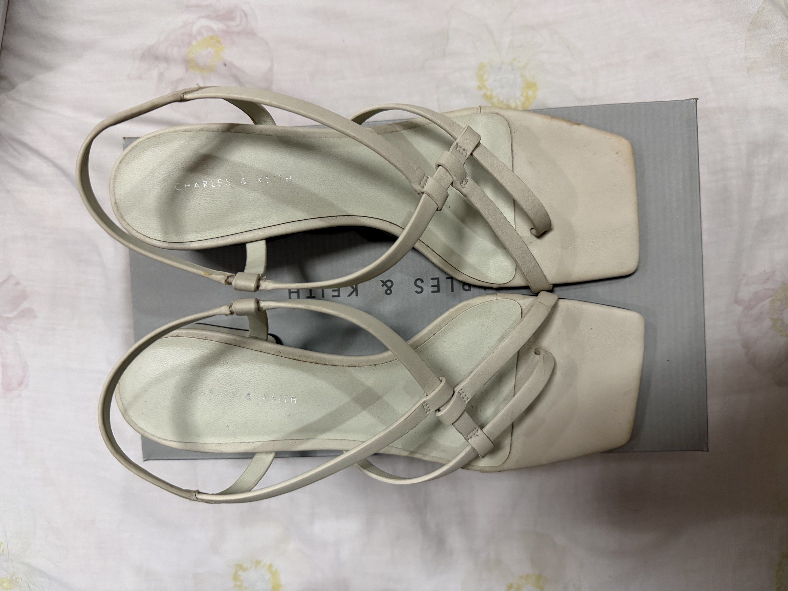 Charles & Keith Chalk Thong Sandals Size 38 (Category: Flats & Sandals) located in Quezon City. Submitted by chasy9 (Listing ID 1420871999, Image 1). Description: - Charles & Keith sandals - Chalk color - Thong sandal design - Size 38 - Block heel - Minimalist style - Comes with original box - Perfect for casual and dressy wear.