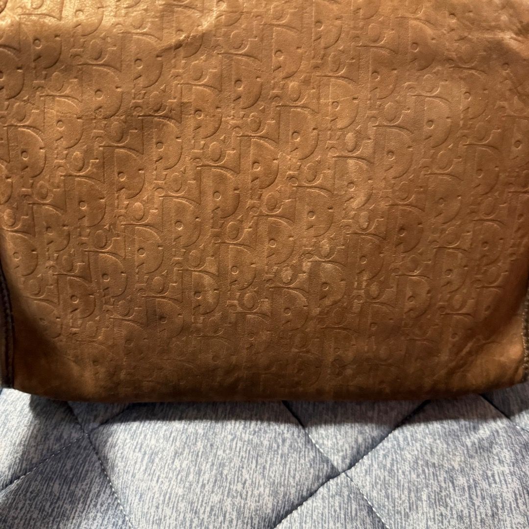 Christian Dior Brown (Category: Luxury Bags & Wallets) located in Cavite. Submitted by rcmontoya (Listing ID 1420876059, Image 1). Description: - Authentic Christian Dior travel clutch/pouch - Brown exterior with Dior logo pattern - Interior with multiple compartments - Gold-toned zipper - Made in France.
