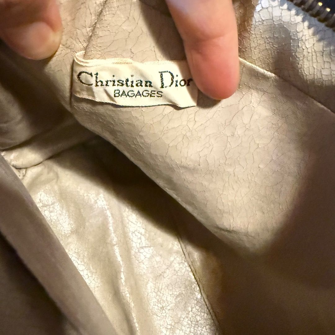 Christian Dior Brown (Category: Luxury Bags & Wallets) located in Cavite. Submitted by rcmontoya (Listing ID 1420876059, Image 2). Description: - Authentic Christian Dior travel clutch/pouch - Brown exterior with Dior logo pattern - Interior with multiple compartments - Gold-toned zipper - Made in France.