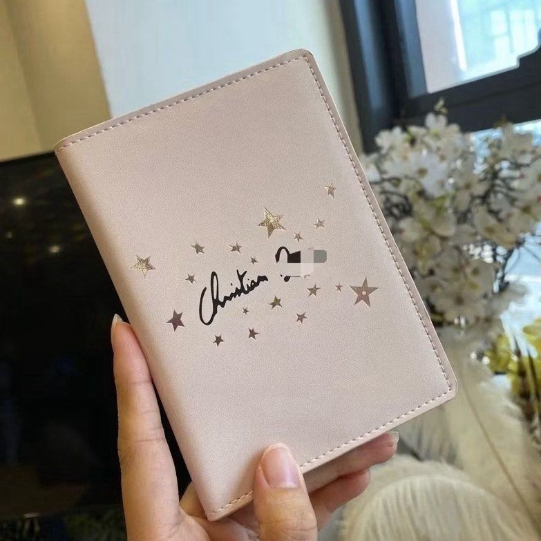 Christian Dior Passport Holder (Category: Luxury Bags & Wallets) located in Mabalacat. Submitted by dreamsolutions.326 (Listing ID 1420774001, Image 2). Description: - Christian Dior passport holder - Available in multiple colors - Features the Christian Dior logo and star design (on select models) - Made of genuine leather - Sleek and compact design - Securely holds your passport - Easy to carry.