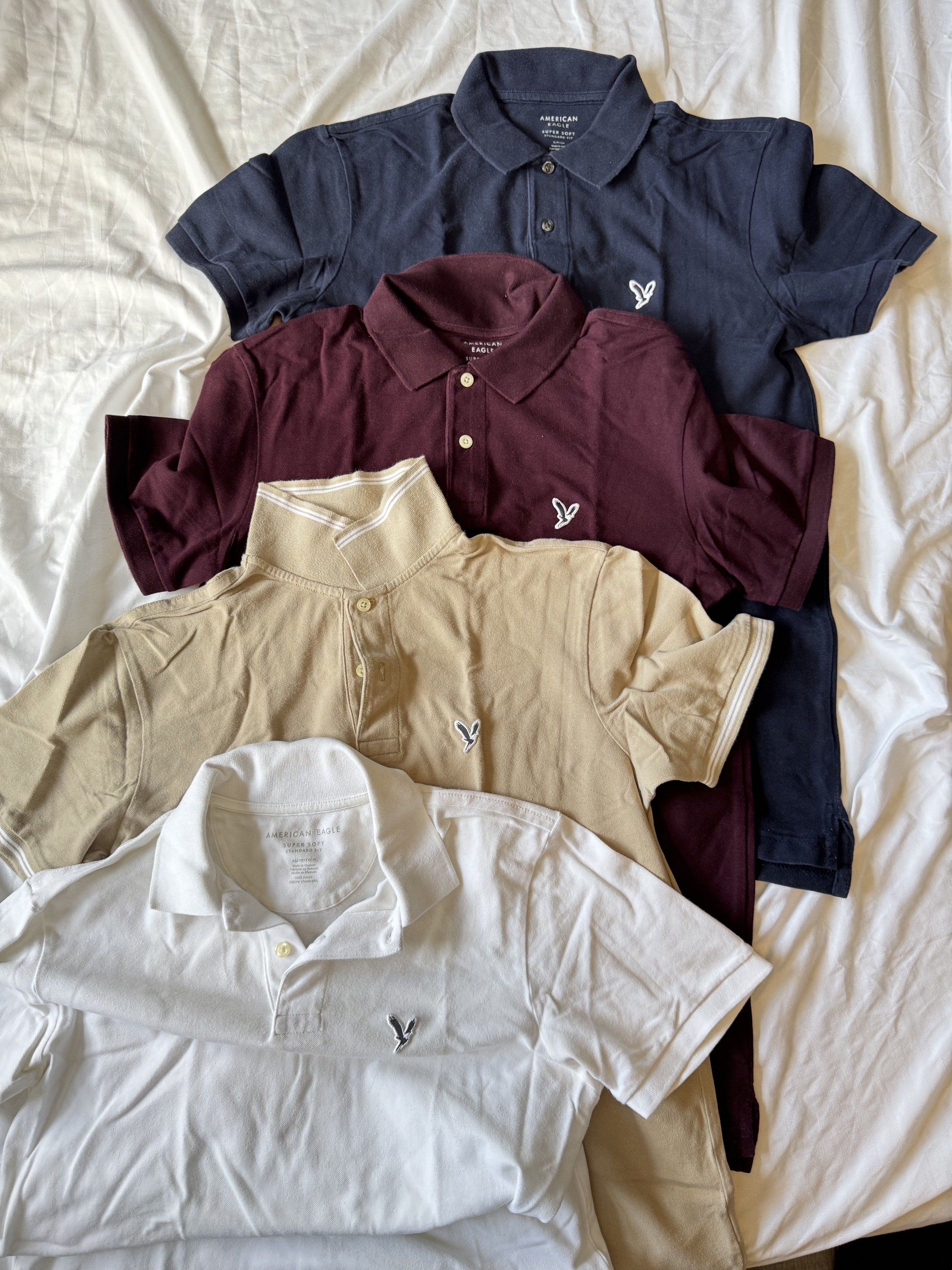 Declutterring!! American Eagle Polo Shirts (XS/S mens) (Category: Tshirts & Polo Shirts ) located in Quezon City. Submitted by elle.declutters.ph (Listing ID 1420800190, Image 1). Description: - American Eagle Polo Shirts - Sizes: XS/S (Men's) - Colors: Navy Blue, Maroon, Beige, White (xs) - Comfortable and stylish - 900 each! 1,700 for 2, 2,500 for 3. - 3,200 TAKE ALL.