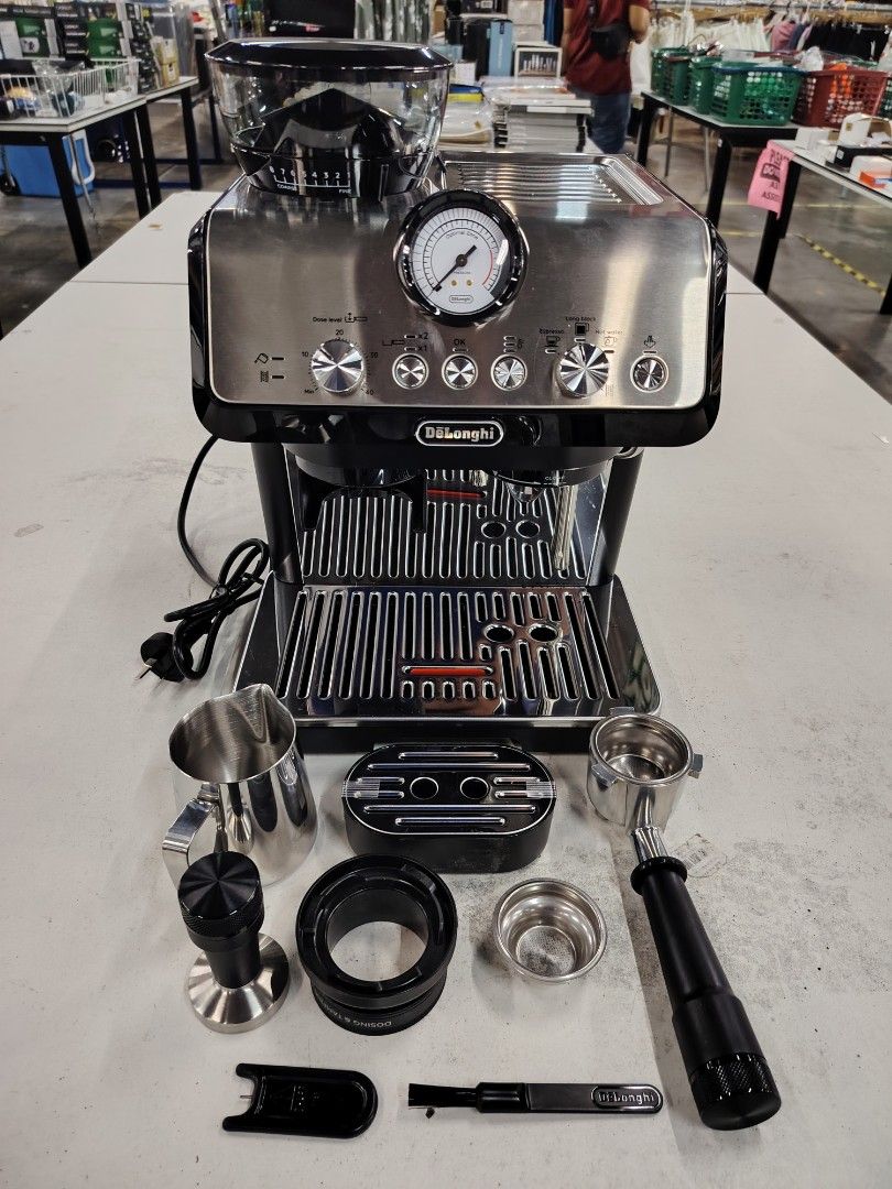 DeLonghi Espresso and Cappuccino Maker (Category: Coffee Machines & Makers) located in Manila. Submitted by rollysuela09206 (Listing ID 1420760364, Image 3). Description: - DeLonghi espresso and cappuccino maker - Built-in grinder - Includes: portafilter, tamper, milk frothing pitcher - Features: pressure gauge, control dials - Comes with original box - Limited item -Call or Text 09757387803 .