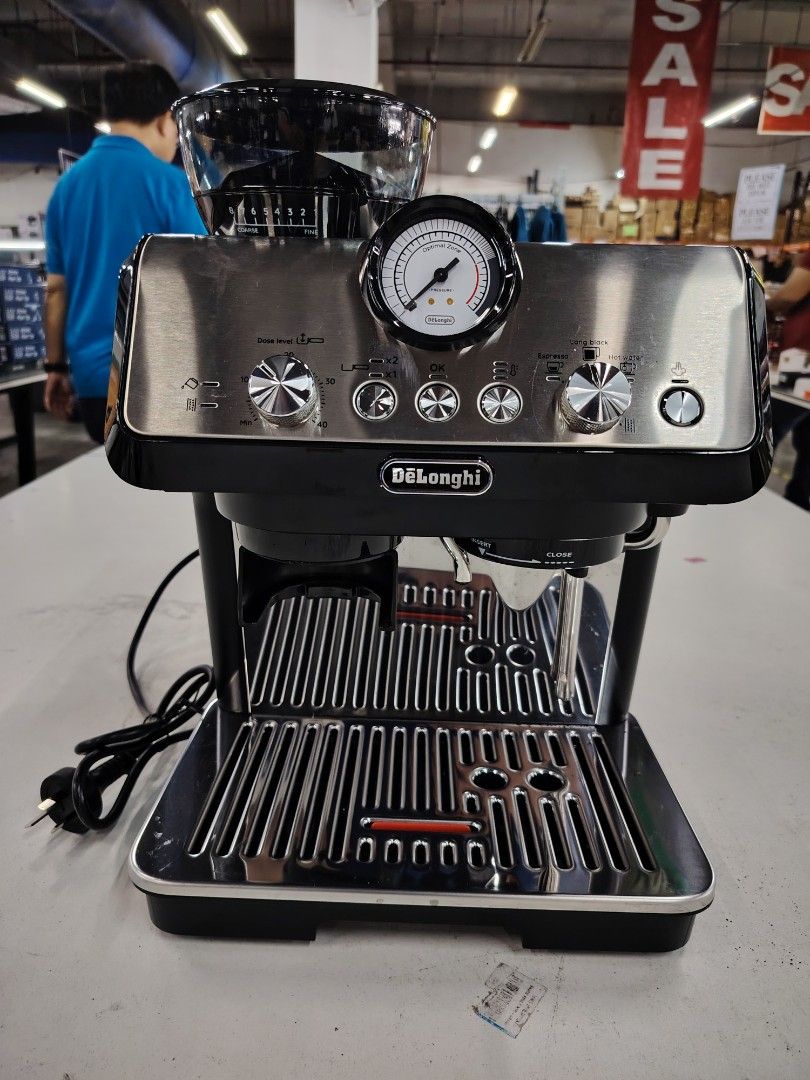 DeLonghi Espresso and Cappuccino Maker (Category: Coffee Machines & Makers) located in Manila. Submitted by rollysuela09206 (Listing ID 1420760364, Image 2). Description: - DeLonghi espresso and cappuccino maker - Built-in grinder - Includes: portafilter, tamper, milk frothing pitcher - Features: pressure gauge, control dials - Comes with original box - Limited item -Call or Text 09757387803 .