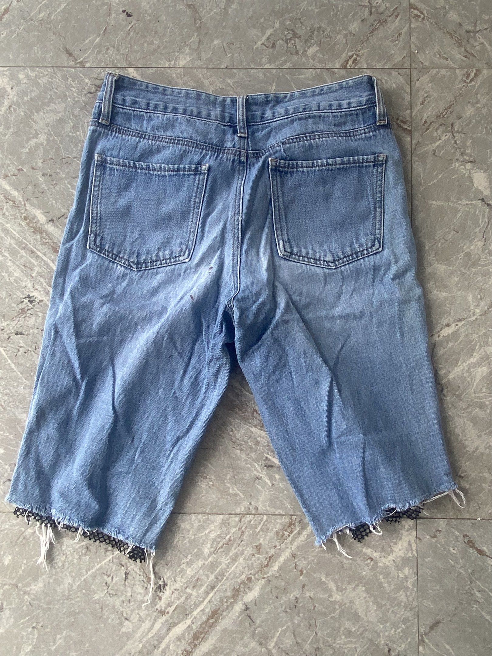 Denim Shorts with Checkered Sides (Category: Shorts) located in Batangas. Submitted by dae.clutter (Listing ID 1420803860, Image 2). Description: - Denim shorts - Light blue wash - Checkered side stripes - Distressed hems with mesh detailing - Knee-length ₱100 + sf.