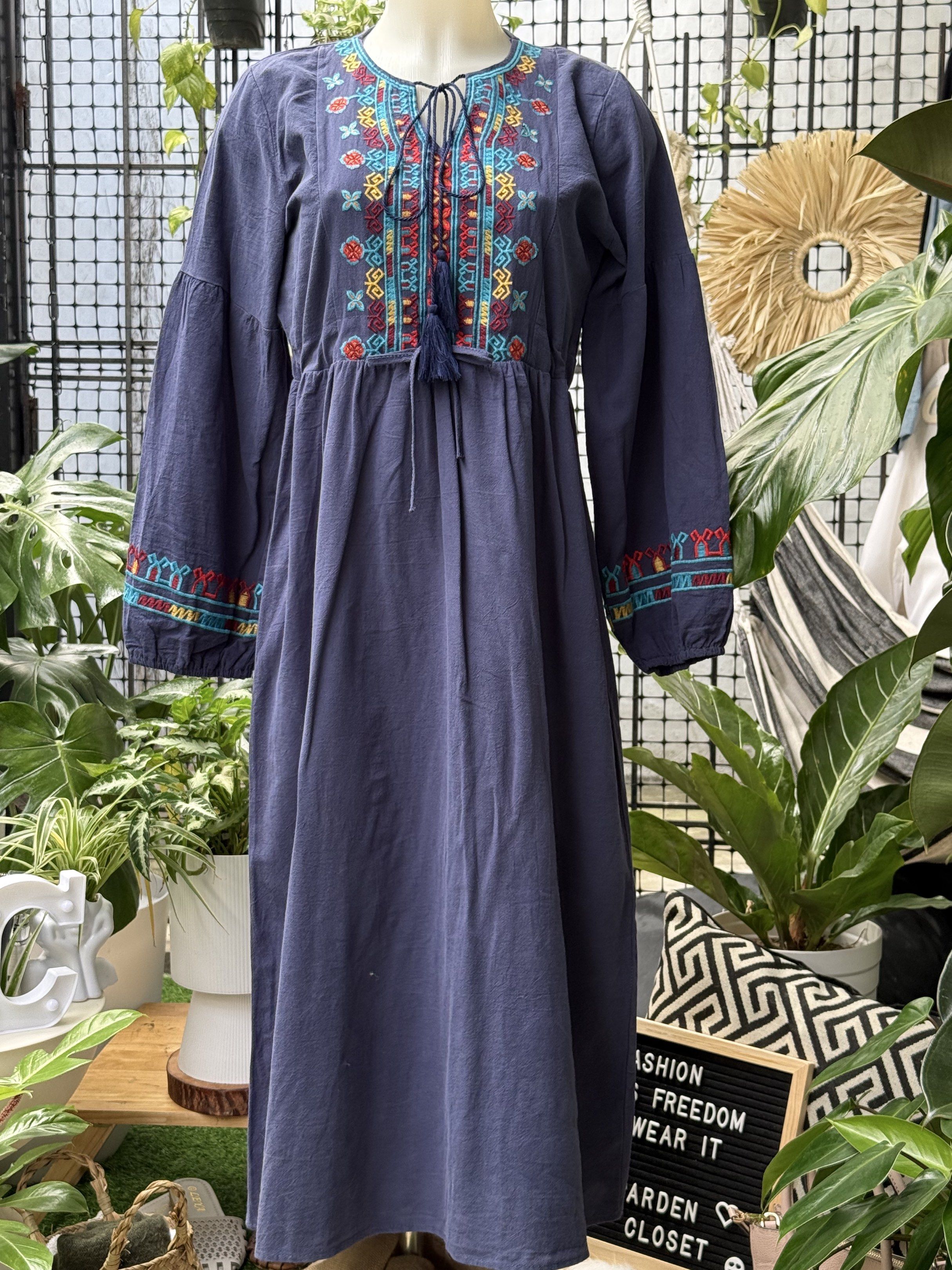 Embroidered Navy Blue Dress (Category: Dresses) located in Manila. Submitted by rewardyourself (Listing ID 1420802647, Image 2). Description: - Kamiseta Navy blue midi dress - Intricate embroidery on bodice and sleeves - Drawstring waist - Long sleeves - Relaxed fit - Midi length - Colorful embroidery details - Ideal for casual, stylish looks.