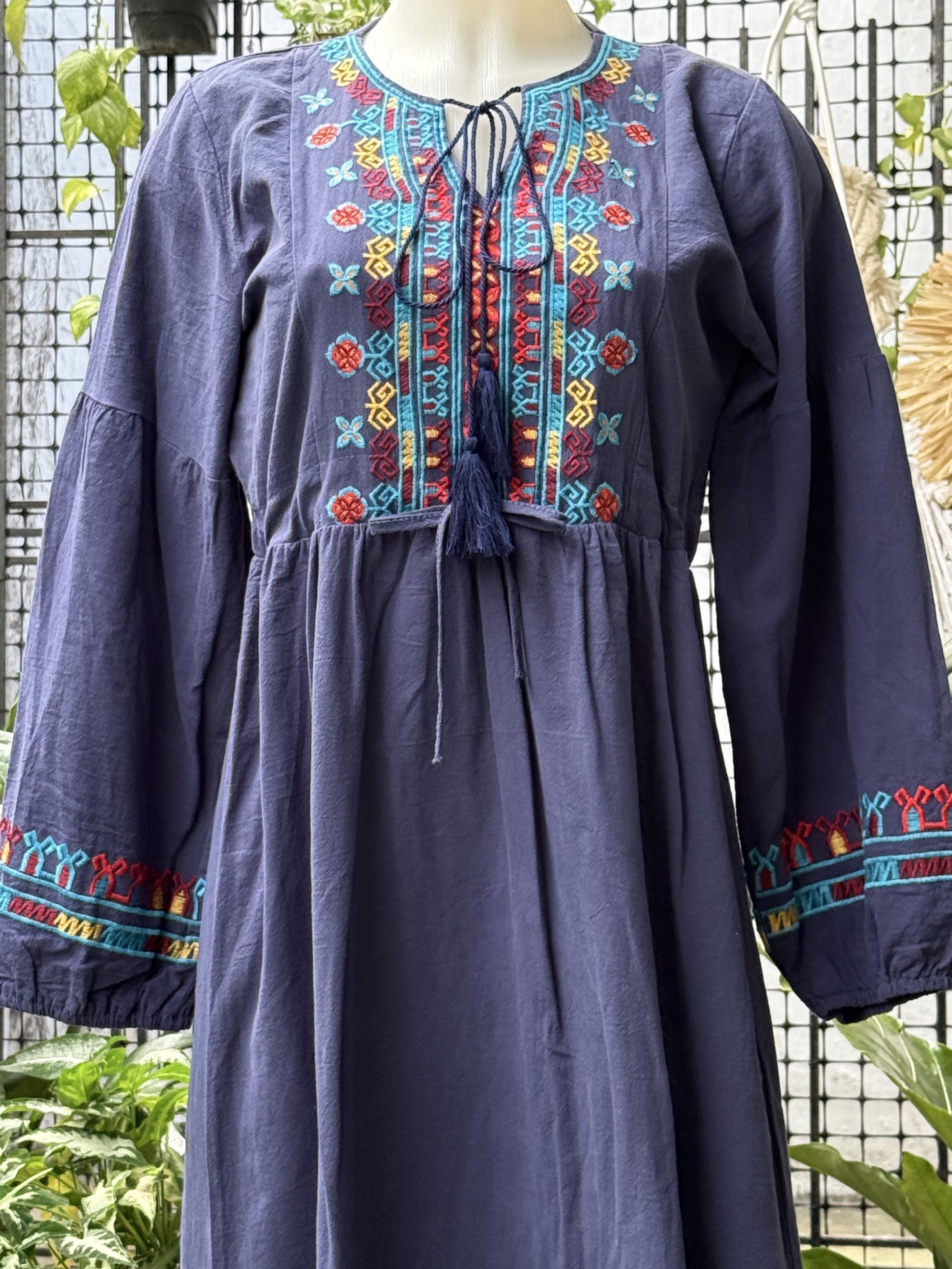 Embroidered Navy Blue Dress (Category: Dresses) located in Manila. Submitted by rewardyourself (Listing ID 1420802647, Image 3). Description: - Kamiseta Navy blue midi dress - Intricate embroidery on bodice and sleeves - Drawstring waist - Long sleeves - Relaxed fit - Midi length - Colorful embroidery details - Ideal for casual, stylish looks.
