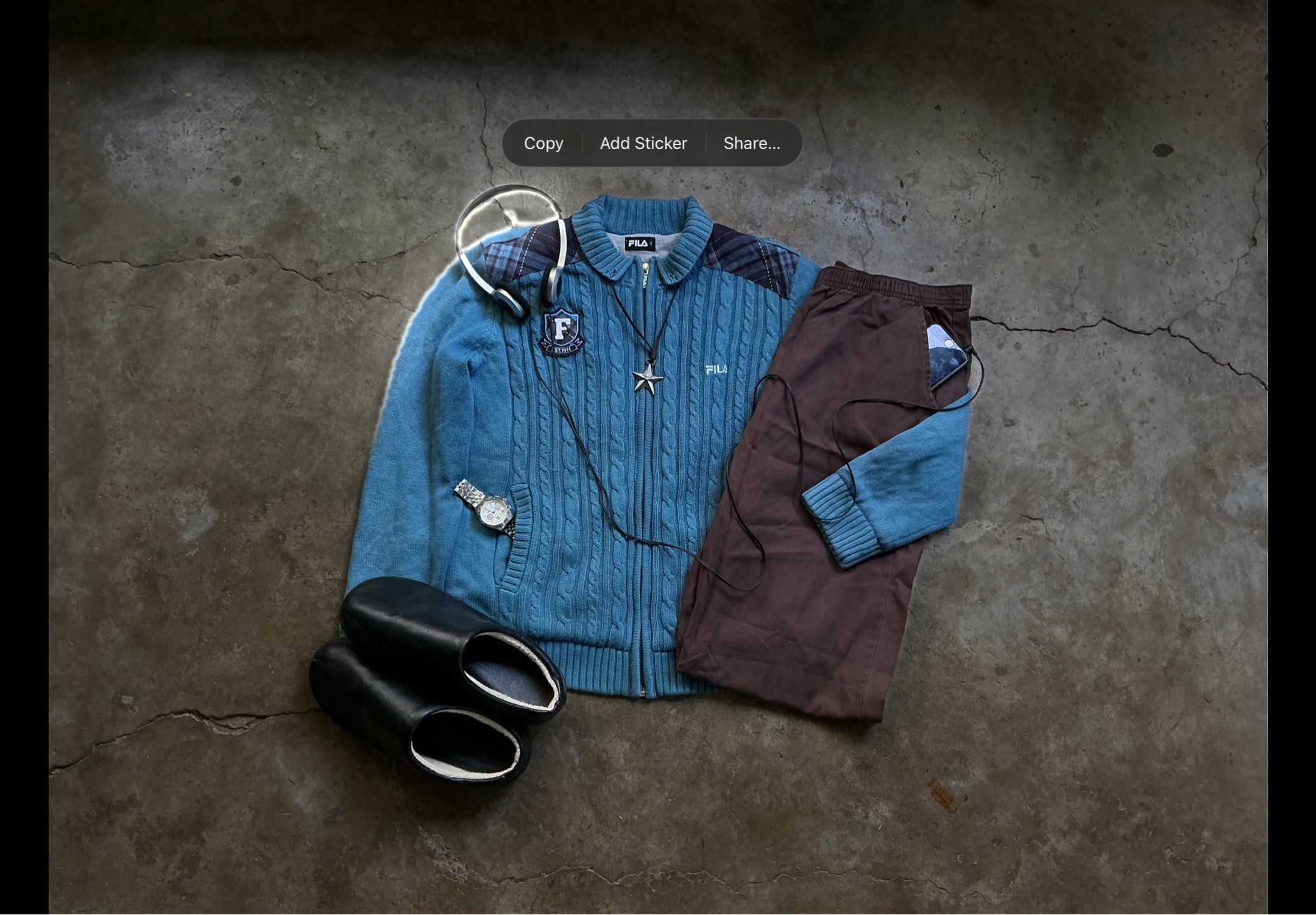 Fila Blue Cable Knit Jacket and Brown Pants Set (Category: Coats, Jackets and Outerwear) located in San Pablo. Submitted by rushnthrift (Listing ID 1420909872, Image 1). Description: - Fila jacket and pants set - Jacket Details: - Blue cable knit design - Zipper closure - Star pendant - Fila logo - Plaid shoulder detail - Small "F" patch - Jacket Measurements: 17" chest, 22" length - Stylish and ready to wear!.