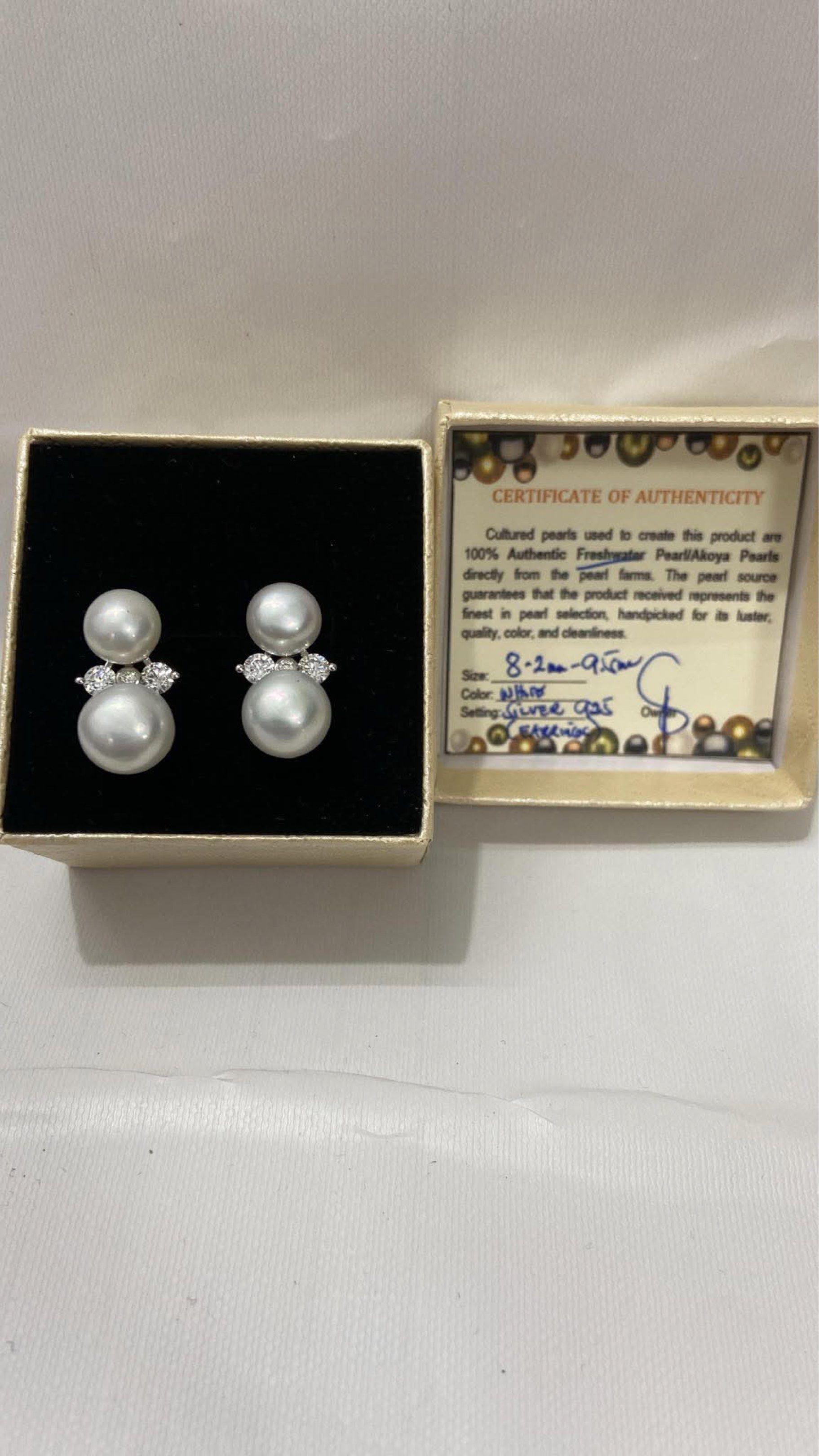Freshwater Pearl Earrings Silver 925 (Category: Earrings) located in Manila. Submitted by chic_clicks (Listing ID 1420880075, Image 2). Description: - Exquisite freshwater pearl earrings - Silver setting - Pearl size: 8.2mm - 9.5mm - Includes Certificate of Authenticity - Perfect for any occasion - Makes a beautiful gift.
