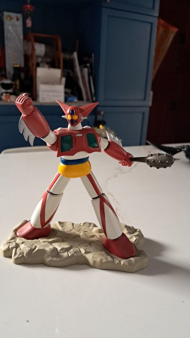 Getter Robo G Getter 1 Action Figure (Category: Figurines & Statues) located in Santa Rosa. Submitted by majanice (Listing ID 1420765775, Image 1). Description: - Getter Robo G Getter 1 action figure - Eye-catching red, white, yellow, and green color scheme - Includes a detailed rocky base - Comes with a weapon accessory - Features articulated joints for posing - Highly collectible item.