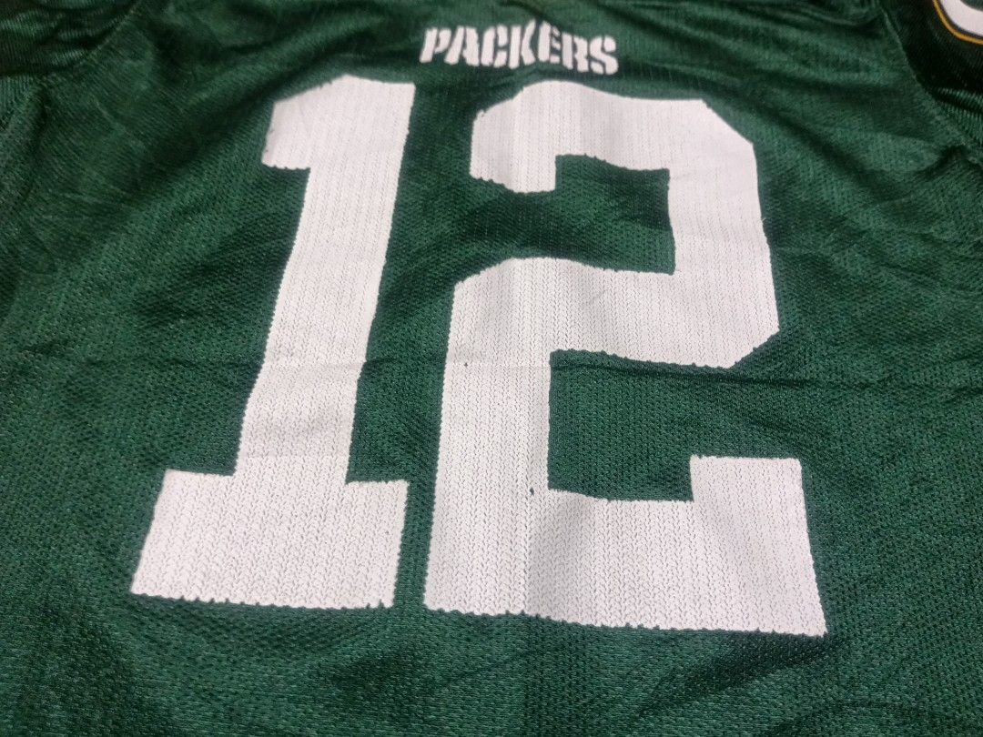 GREEN BAY PACKERS RODGERS JERSEY #12 (Category: Activewear) located in Calamba. Submitted by lostandfoundoutfitters (Listing ID 1420900841, Image 3). Description: GREEN BAY PACKERS "RODGERS" NFL JERSEY #12 Dimes: 17.5 x 23 Condition: 9/10 No Issue: Need Wash Only! Authentic 💯 Collectible 💯 Hand Picked •ITEMS ARE FROM THRIFT SHOP SO LIMIT YOUR EXPECTATIONS. •WASH THE CLOTHES BEFORE WEARING. •BUY AT YOUR OWN RISK. • COLOR MAY VARY DUE TO LIGHTING