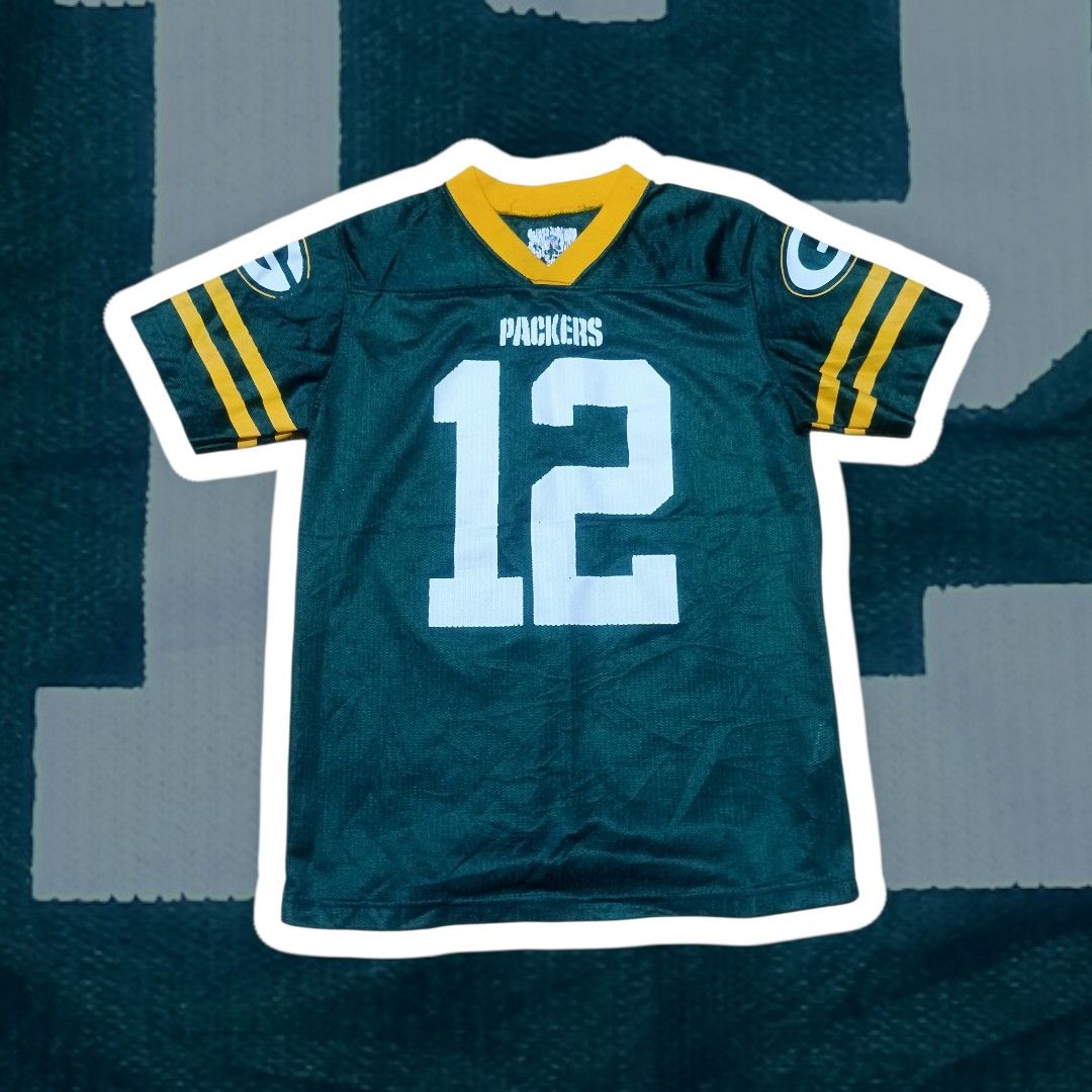 GREEN BAY PACKERS RODGERS JERSEY #12 (Category: Activewear) located in Calamba. Submitted by lostandfoundoutfitters (Listing ID 1420900841, Image 1). Description: GREEN BAY PACKERS "RODGERS" NFL JERSEY #12 Dimes: 17.5 x 23 Condition: 9/10 No Issue: Need Wash Only! Authentic 💯 Collectible 💯 Hand Picked •ITEMS ARE FROM THRIFT SHOP SO LIMIT YOUR EXPECTATIONS. •WASH THE CLOTHES BEFORE WEARING. •BUY AT YOUR OWN RISK. • COLOR MAY VARY DUE TO LIGHTING