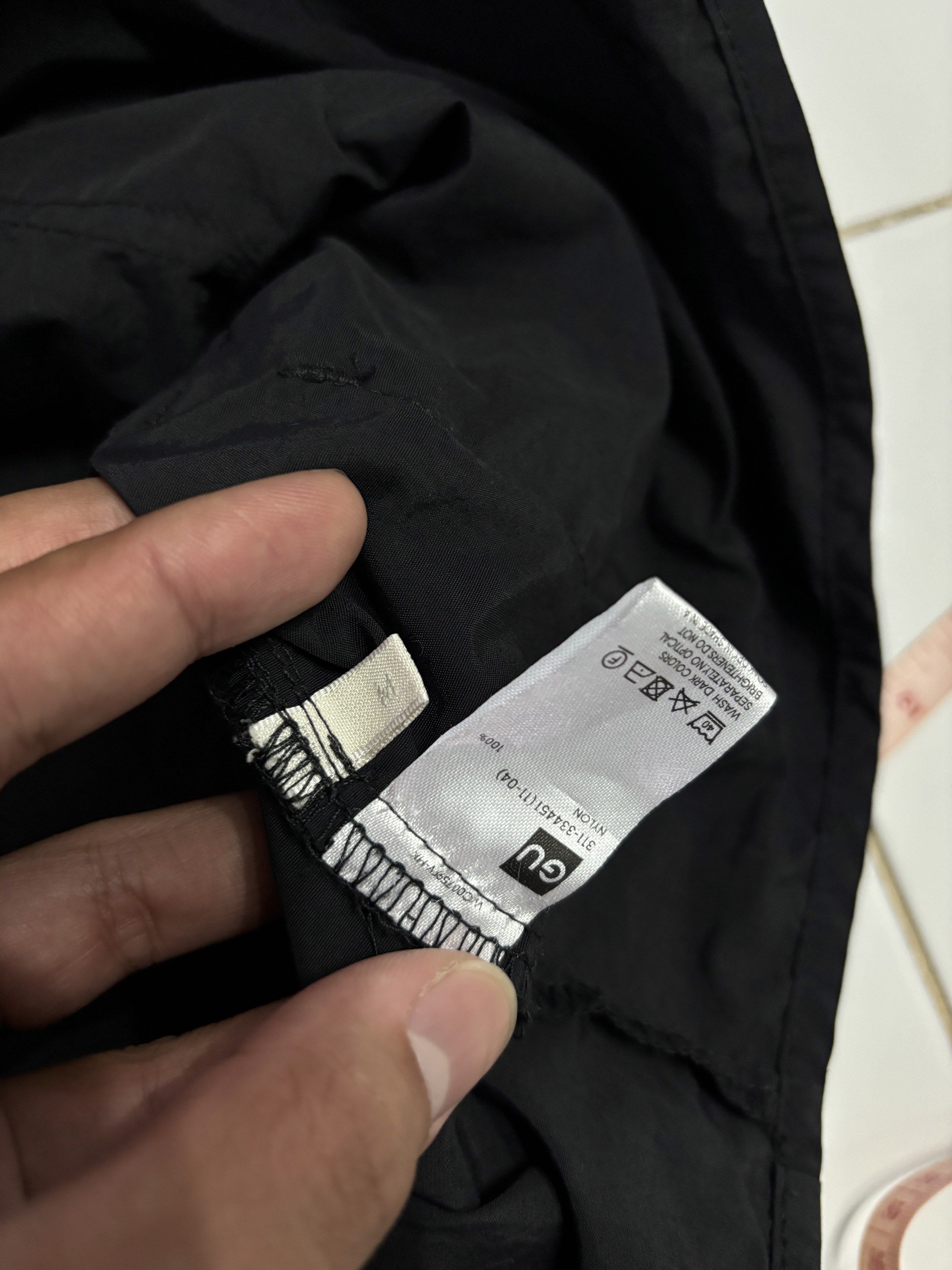GU Black Utility Vest (Category: Vests) located in Manila. Submitted by Caps4everyone (Listing ID 1420879345, Image 2). Description: For sale only Wolf gildan shirt Price: 600 Size: medium Issue: white marks Location:caloocan Shipping: lbc and lalamove Pm for sure buyer only.