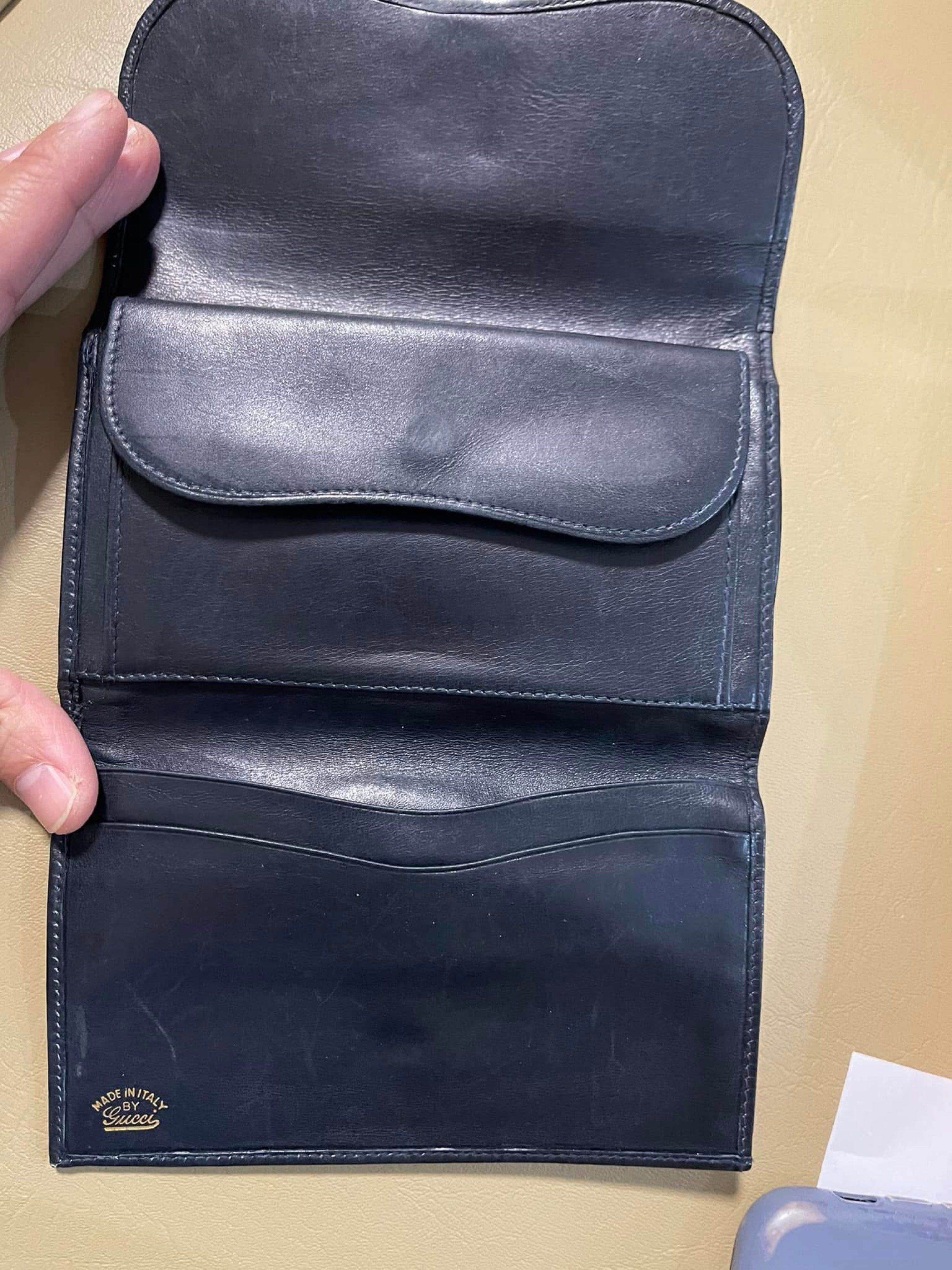 Gucci GG Monogram Wallet (Category: Luxury Bags & Wallets) located in Manila. Submitted by clairetot (Listing ID 1420824500, Image 2). Description: - Authentic Gucci wallet pre loves - Iconic GG monogram - Navy blue leather trim & interior - Multiple card & cash compartments - Coin pocket - Made in Italy - Gold-tone clasp closure.