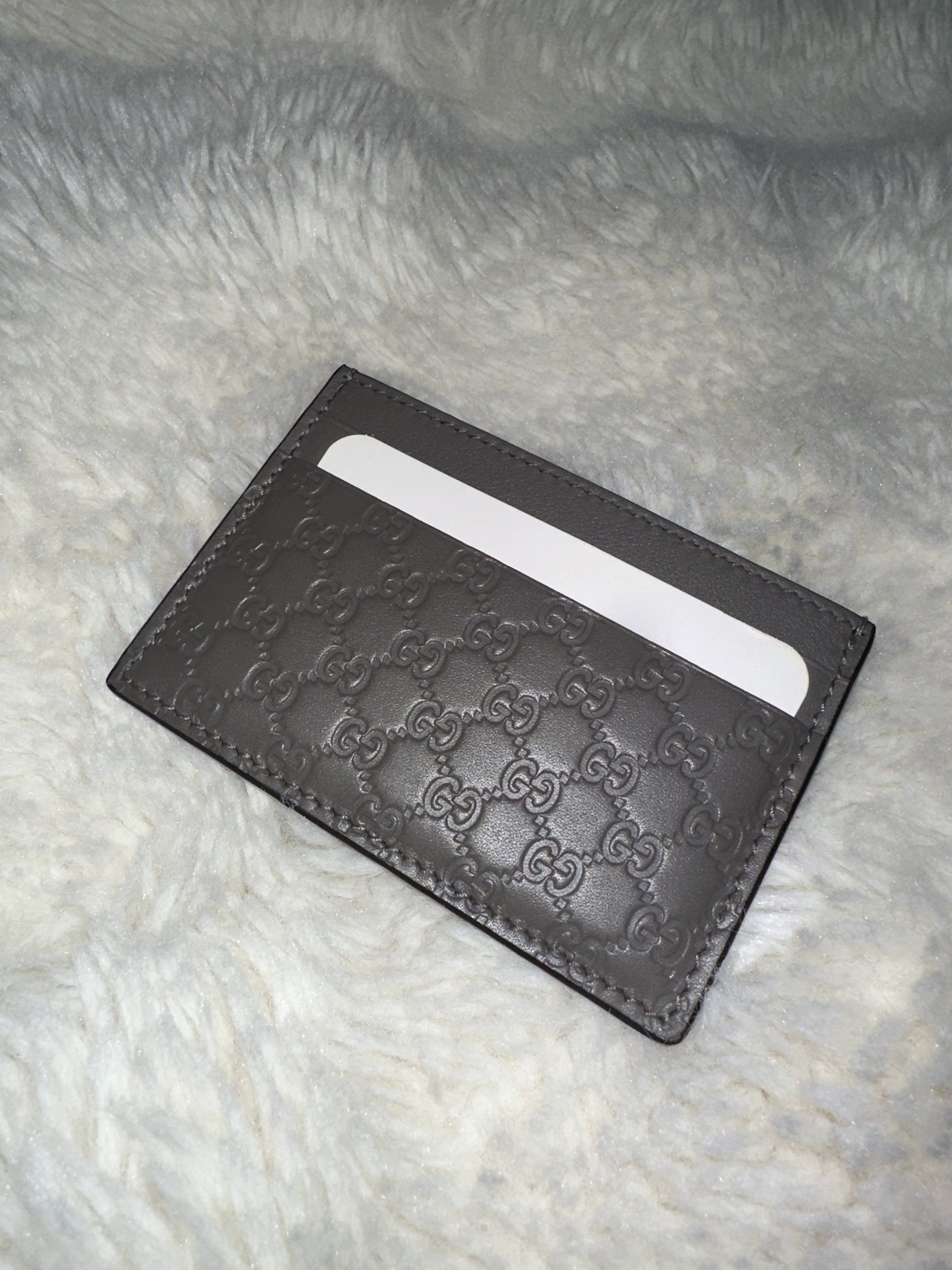 Authentic Microguccissima Leather Gray Card Holder (Category: Luxury Bags & Wallets) located in Cabatuan. Submitted by cln_co (Listing ID 1420847269, Image 2). Description: Authentic Gucci card holder Iconic micro-embossed GG pattern Leather Multiple card slots Stamped with Gucci logo and serial number Excellent condition, once used No inclusions, item only Negotiable Rfs: decluttering.