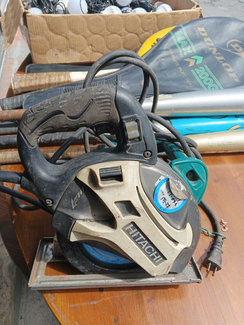 Hitachi Circular Saw (Category: Construction Tools & Equipment) located in Caloocan City. Submitted by gemmareas571129 (Listing ID 1420788059, Image 1). Description: - Hitachi circular saw - Black and beige body with teal handle - Includes power cord - Saw blade visible - In good working condition - Ideal for cutting tasks.