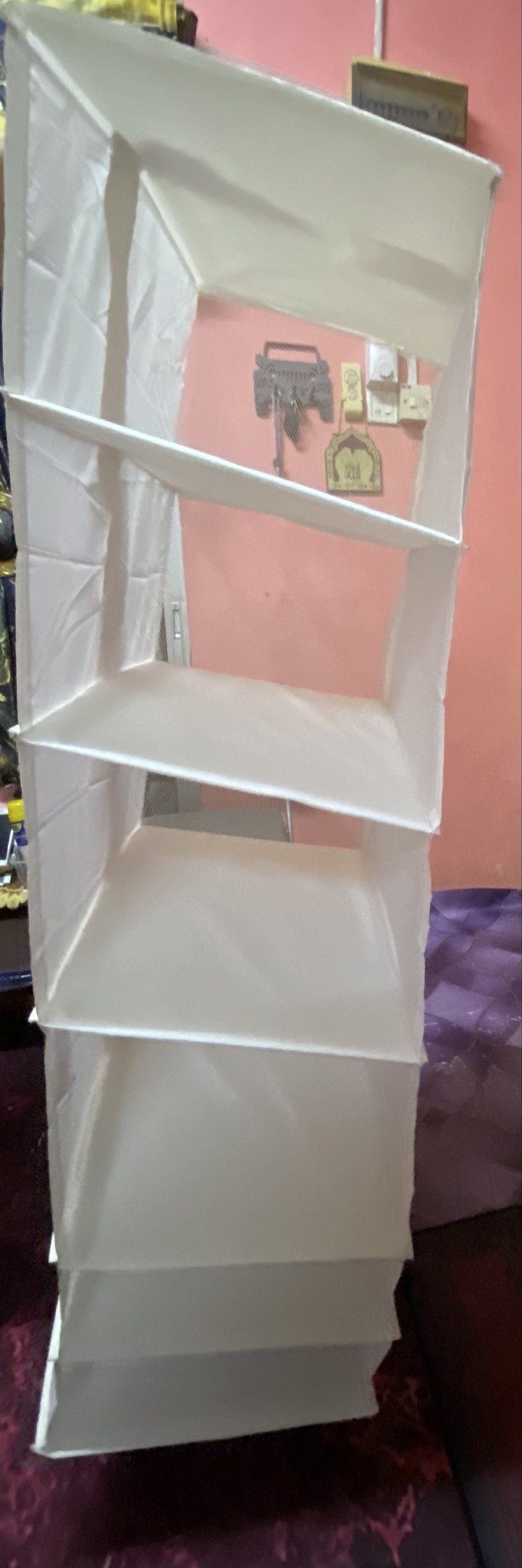 Ikea skub (Category: Shelves, Cabinets & Racks) located in Batang Kali. Submitted by mepreloved__ (Listing ID 1420829708, Image 3). Description: - White hanging organizer - Multiple shelves for storage - Mesh bottom - Velcro straps for hanging - Collapsible design - Ideal for clothes, accessories, and more.