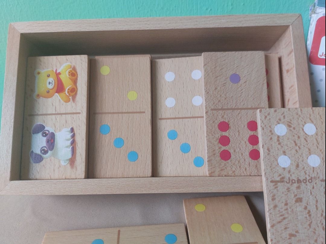 Janod Wooden Dominoes (Category: Board Games & Puzzles) located in Paranaque City. Submitted by ca.firstonlinebiz (Listing ID 1420898608, Image 2). Description: Preloved Janod Wooden Dominoes -28 piece wooden first word themed dominos game -Ideal for helping your child familiarize themselves with first words. Pictures on one side and figures on the other Loc. Greenheights Parañaque Shipping via Lalamove or J&T Express Payment thru Gcash Maya or B