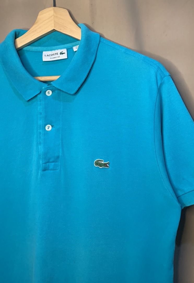 Lacoste Classic Fit Polo Shirt (Category: Tshirts & Polo Shirts ) located in Davao. Submitted by reclaimed_ph (Listing ID 1420889232, Image 2). Description: - Teal blue - 20.5 x 28 - 9 color rate - Very good condition - issue: stain .