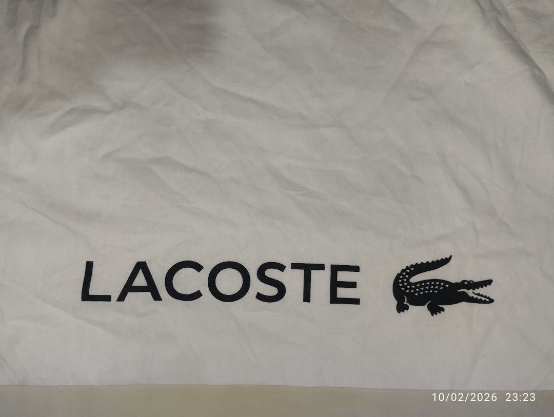 LACOSTE DUST BAG (Category: Luxury Accessories) located in Bacolod City. Submitted by hyoohxzx (Listing ID 1420937135, Image 2). Description: LACOSTE DUST BAG LIKE NEW.