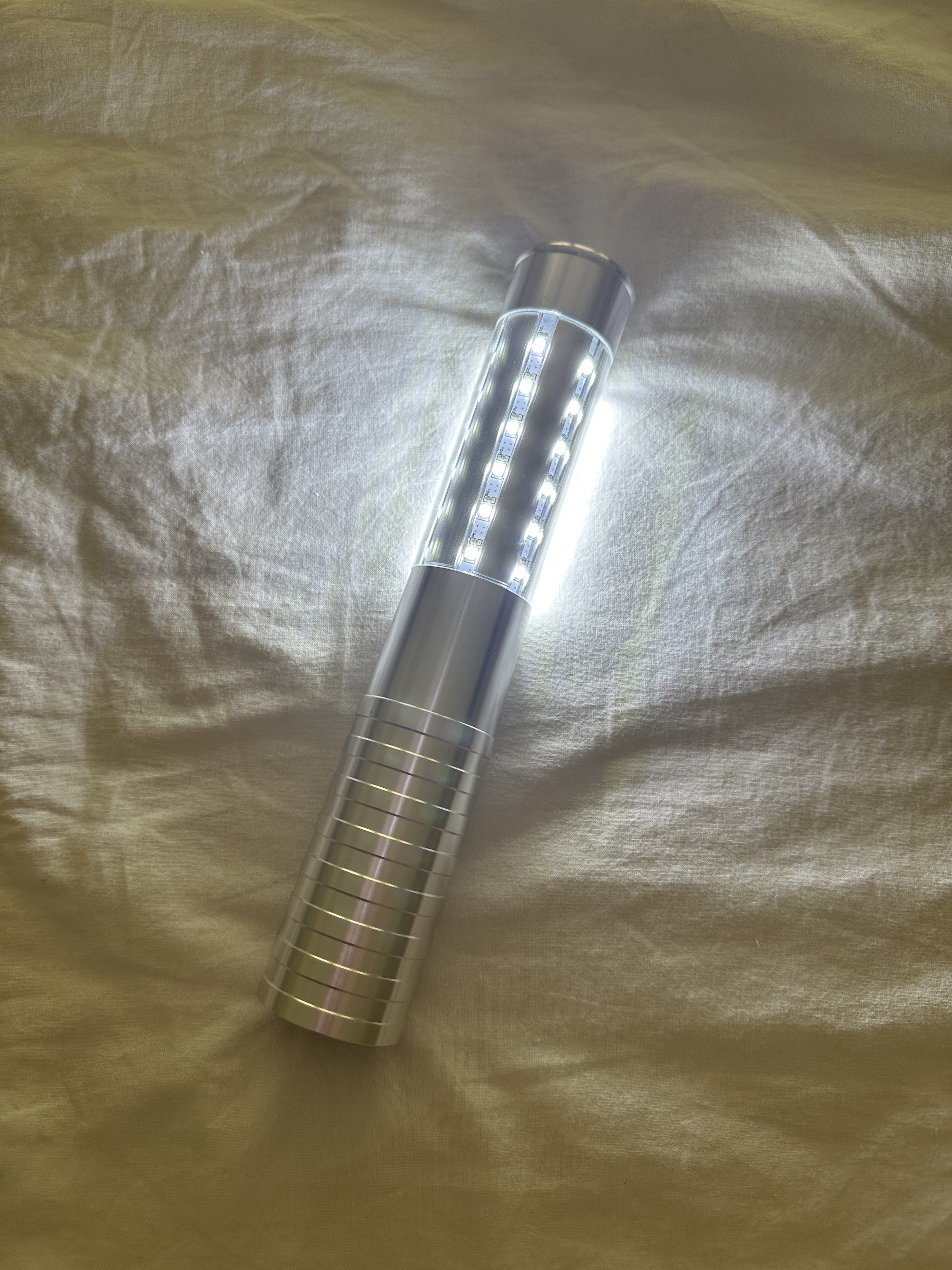 LED Strobe Light Stick (Category: Lighting) located in Paranaque City. Submitted by giatorres (Listing ID 1420759412, Image 1). Description: - Rechargeable LED light for bright illumination. - Features a sleek, silver design. - Provides a strong and focused beam. - Portable and convenient lighting solution. - Ideal for various uses. - Used once for my wedding. - 4 pcs on hand. .