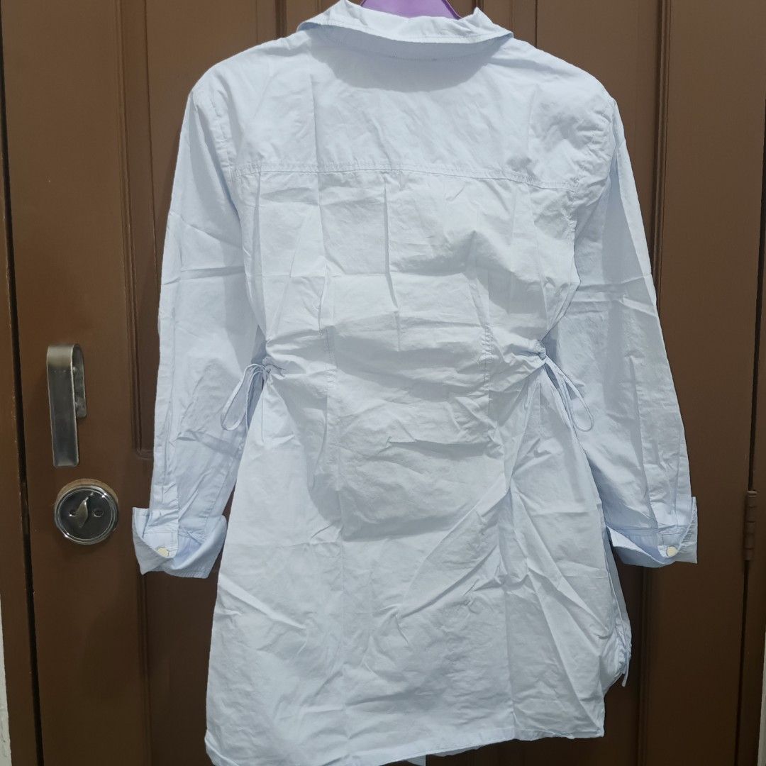 Light Blue Polo Dress with Side Ruch (Category: Tshirts & Polo Shirts ) located in Caloocan City. Submitted by yoon_ara (Listing ID 1420856790, Image 2). Description: ONLY light blue shirt. Collared neckline, long sleeves, and button-down closure. Features ruch ties on the sides. Lightweight fabric. .