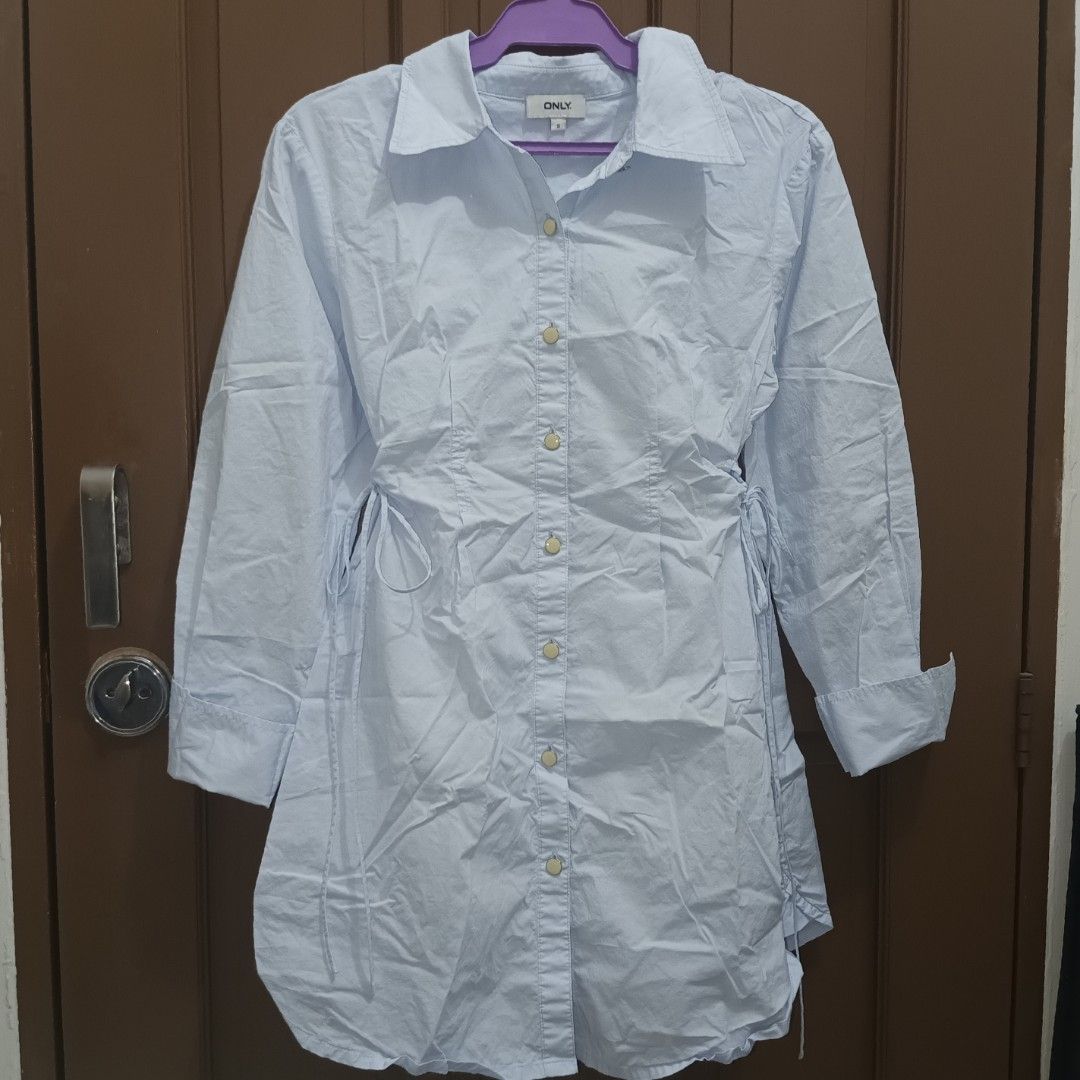 Light Blue Polo Dress with Side Ruch (Category: Tshirts & Polo Shirts ) located in Caloocan City. Submitted by yoon_ara (Listing ID 1420856790, Image 1). Description: ONLY light blue shirt. Collared neckline, long sleeves, and button-down closure. Features ruch ties on the sides. Lightweight fabric. .