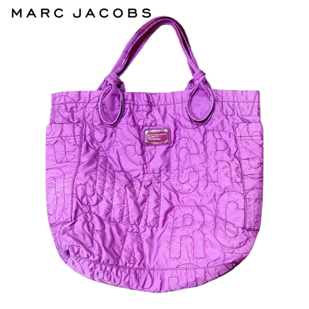Marc Jacobs Tote bag Big Size (authentic) (Category: Luxury Bags & Wallets) located in Cebu City. Submitted by westleygics18 (Listing ID 1420806457, Image 1). Description: - Authentic Marc Jacobs Tote bag Big Size (authentic) - Quilted design with stitched brand name - Double handles with knotted details - Two side pockets - Spacious interior with zip pocket Excellent Condition Dm .