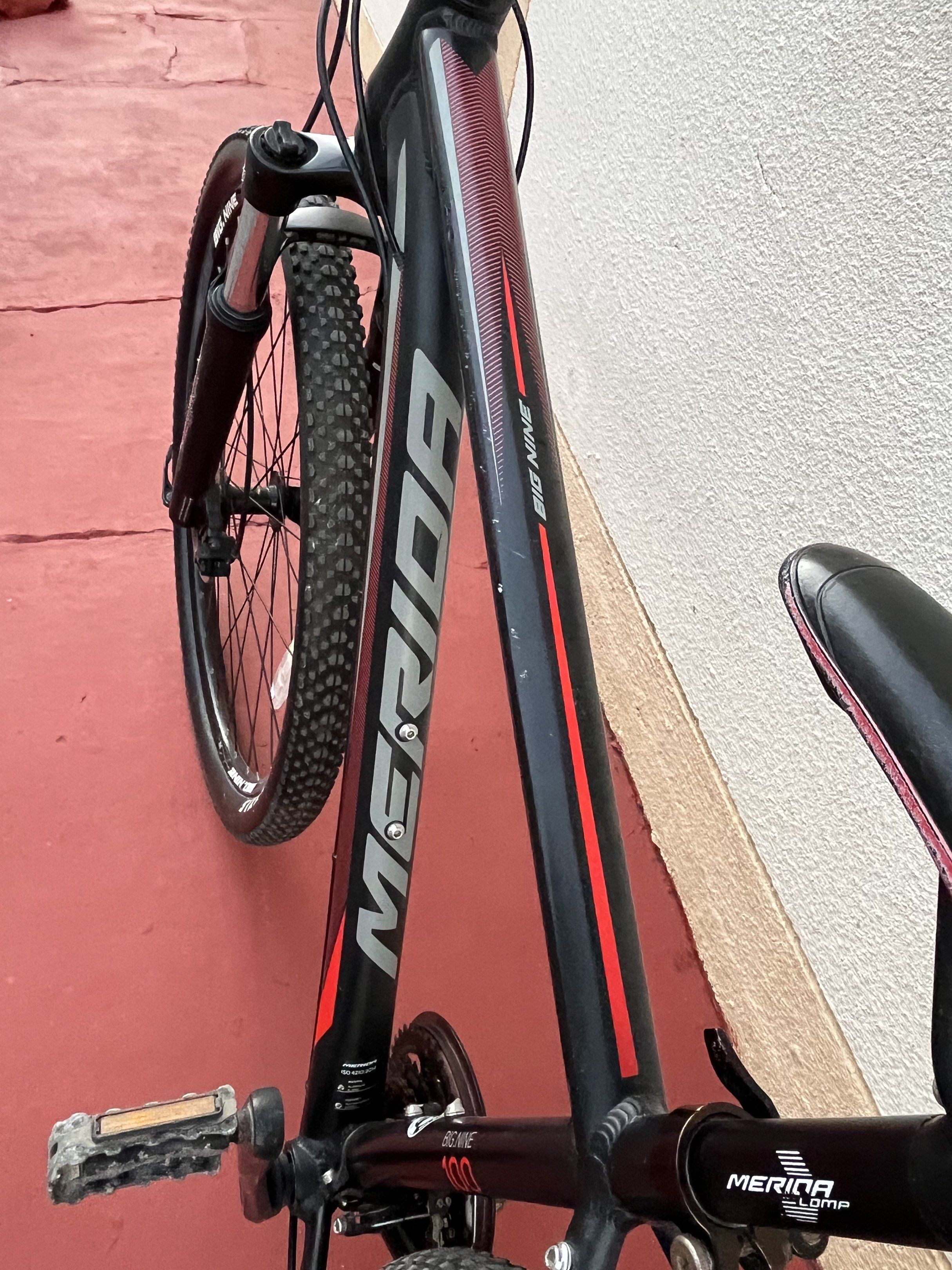 Merida Big Nine 100 Mountain Bike (Category: Bicycles) located in Tarlac. Submitted by jclections (Listing ID 1420853720, Image 2). Description: - Merida Big Nine 100 mountain bike - Disc brakes - Maxxis Big Nine tires - Black and red color - Ergonomic handlebar grips - Merida branding - Well-maintained.