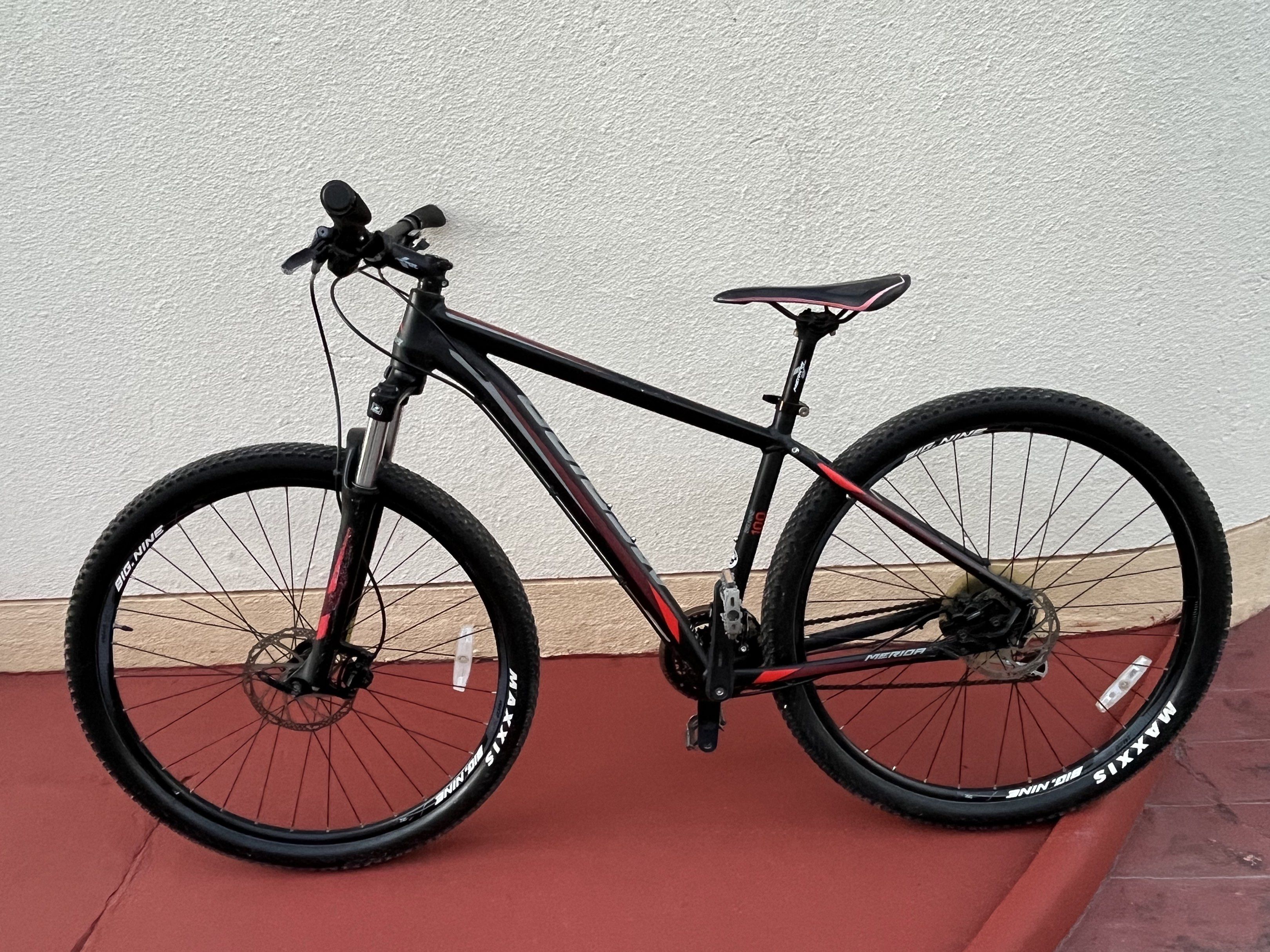 Merida Big Nine 100 Mountain Bike (Category: Bicycles) located in Tarlac. Submitted by jclections (Listing ID 1420853720, Image 1). Description: - Merida Big Nine 100 mountain bike - Disc brakes - Maxxis Big Nine tires - Black and red color - Ergonomic handlebar grips - Merida branding - Well-maintained.
