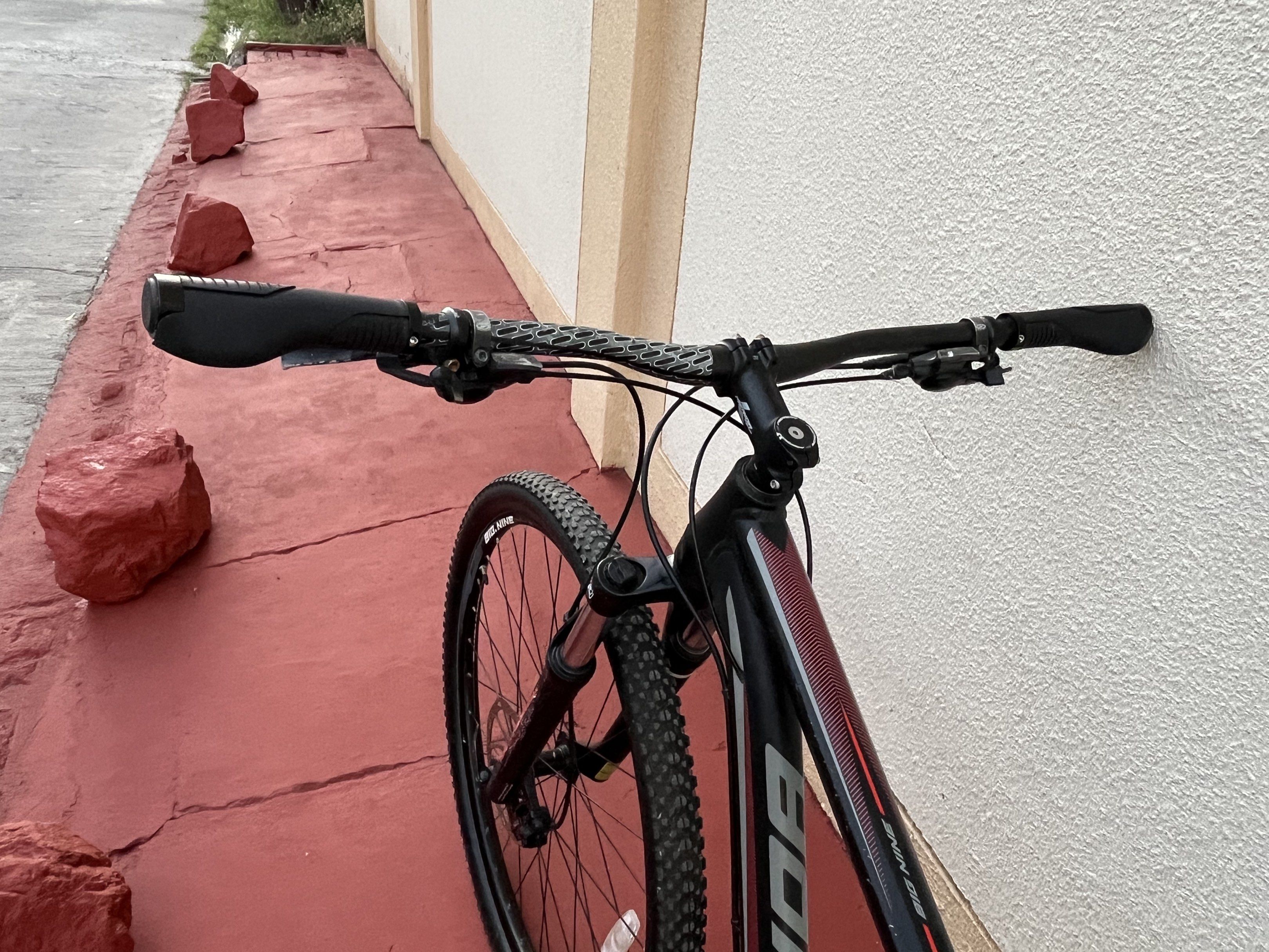 Merida Big Nine 100 Mountain Bike (Category: Bicycles) located in Tarlac. Submitted by jclections (Listing ID 1420853720, Image 3). Description: - Merida Big Nine 100 mountain bike - Disc brakes - Maxxis Big Nine tires - Black and red color - Ergonomic handlebar grips - Merida branding - Well-maintained.