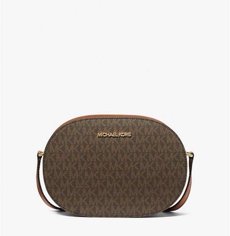 Michael Kors Oval Crossbody Bag (Category: Cross-body Bags) located in Bulacan. Submitted by akspreloved (Listing ID 1420891404, Image 1). Description: used once - from USA.